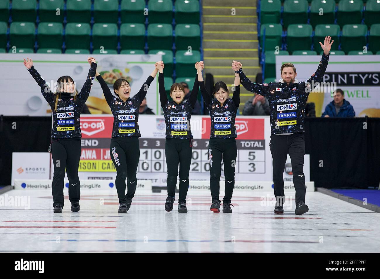 Team Fujisawa celebrate their victory in the final of the Grand Slam of Curling Canadian Open