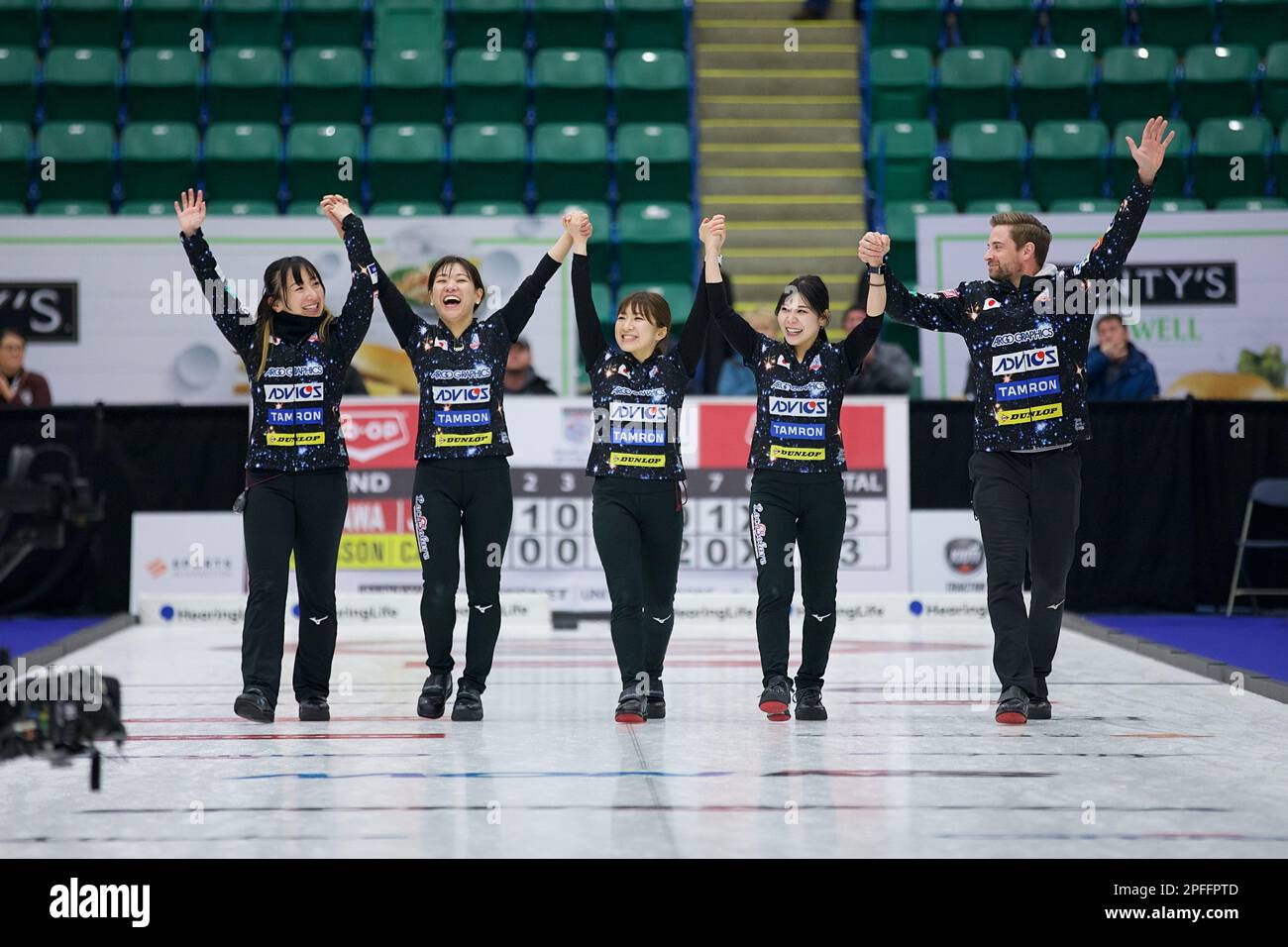 Team Fujisawa celebrate their victory in the final of the Grand Slam of Curling Canadian Open