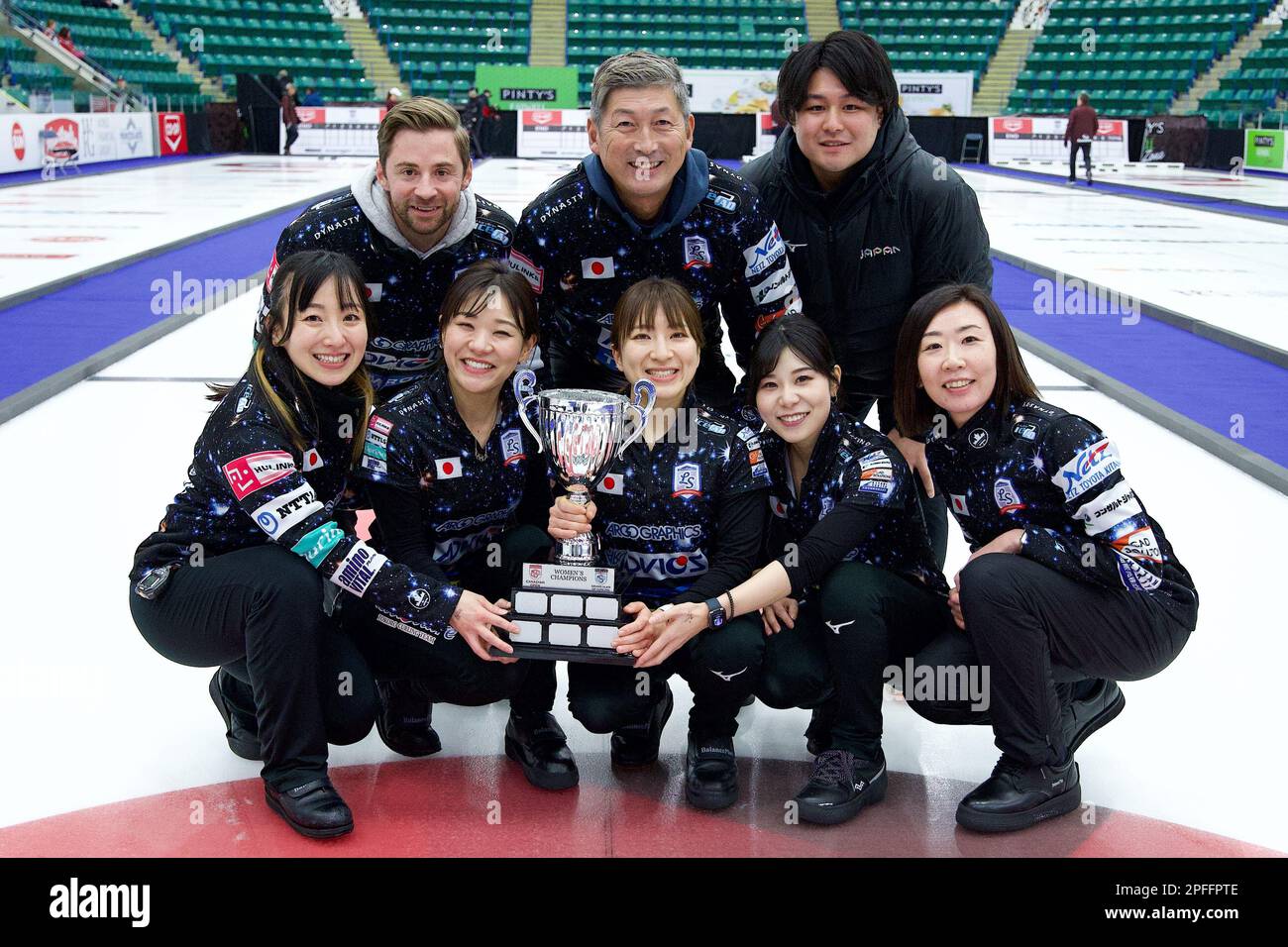 Team Fujisawa pose with the trophy after their victory in the final of the  Grand Slam of Curling - Canadian Open in Camrose, Alberta on January 15,  2023. Front row from L