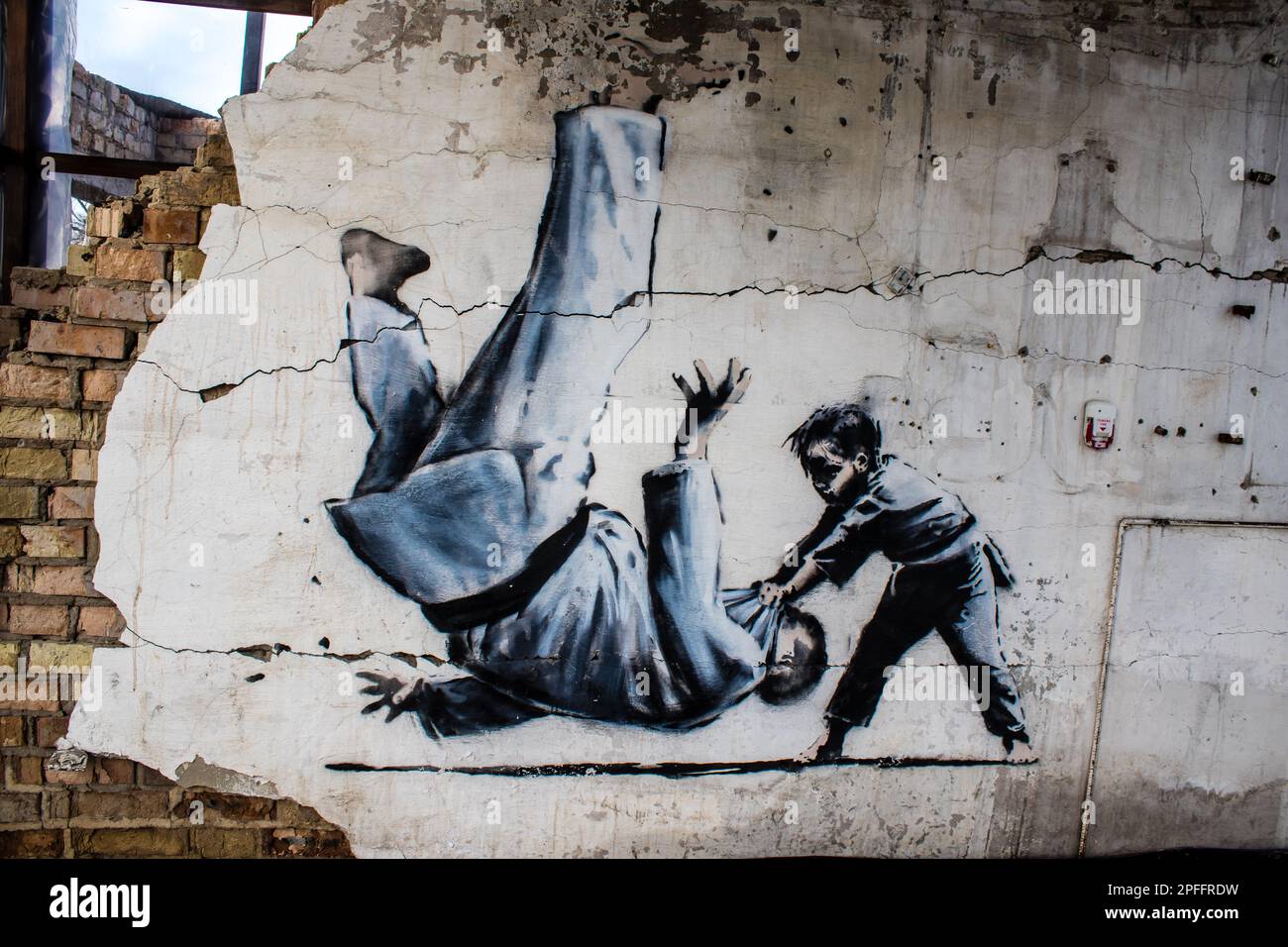 Mural by Banksy in Borodyanka on a ruined building, The image of a