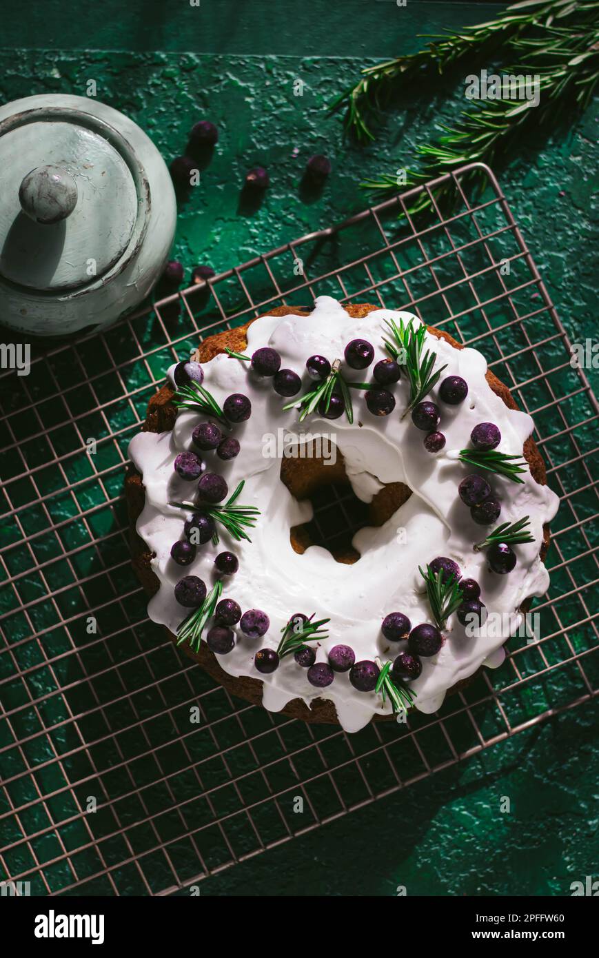 Berry pound cake on a green background. Stock Photo