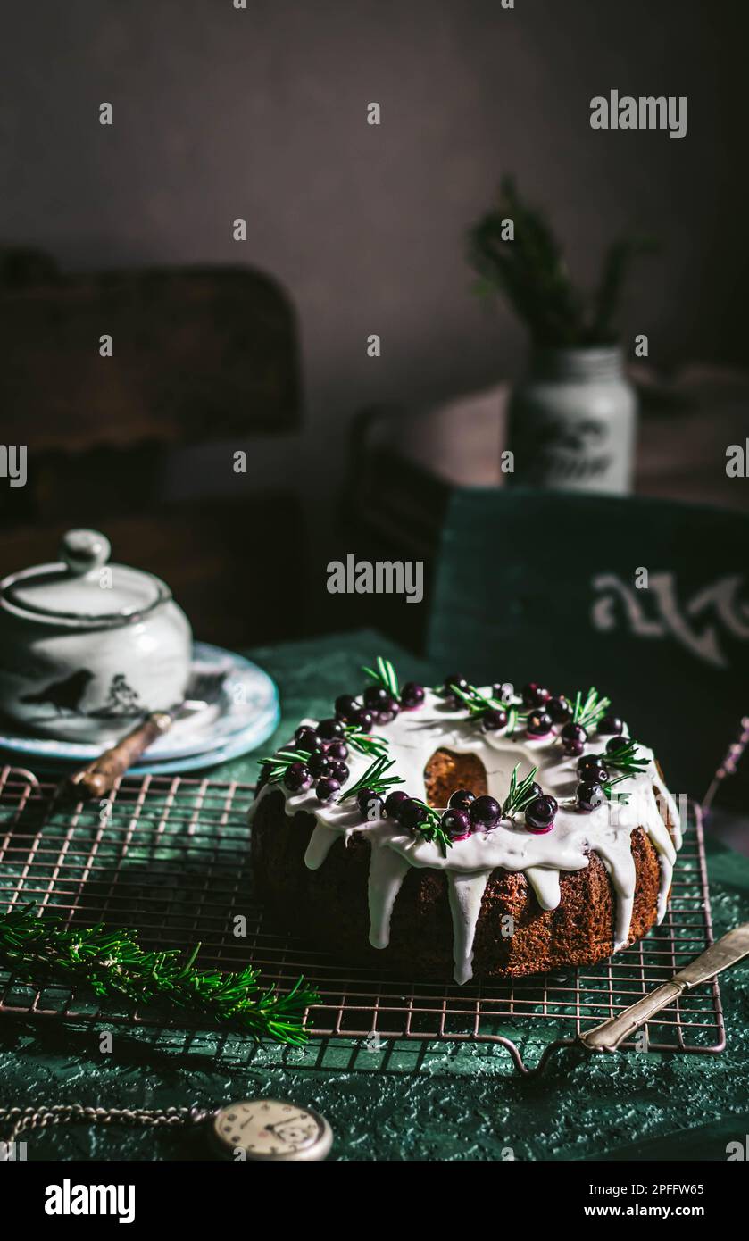 Berry pound cake on a green background. Stock Photo