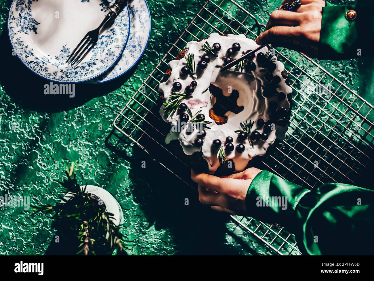 Berry pound cake on a green background. Stock Photo