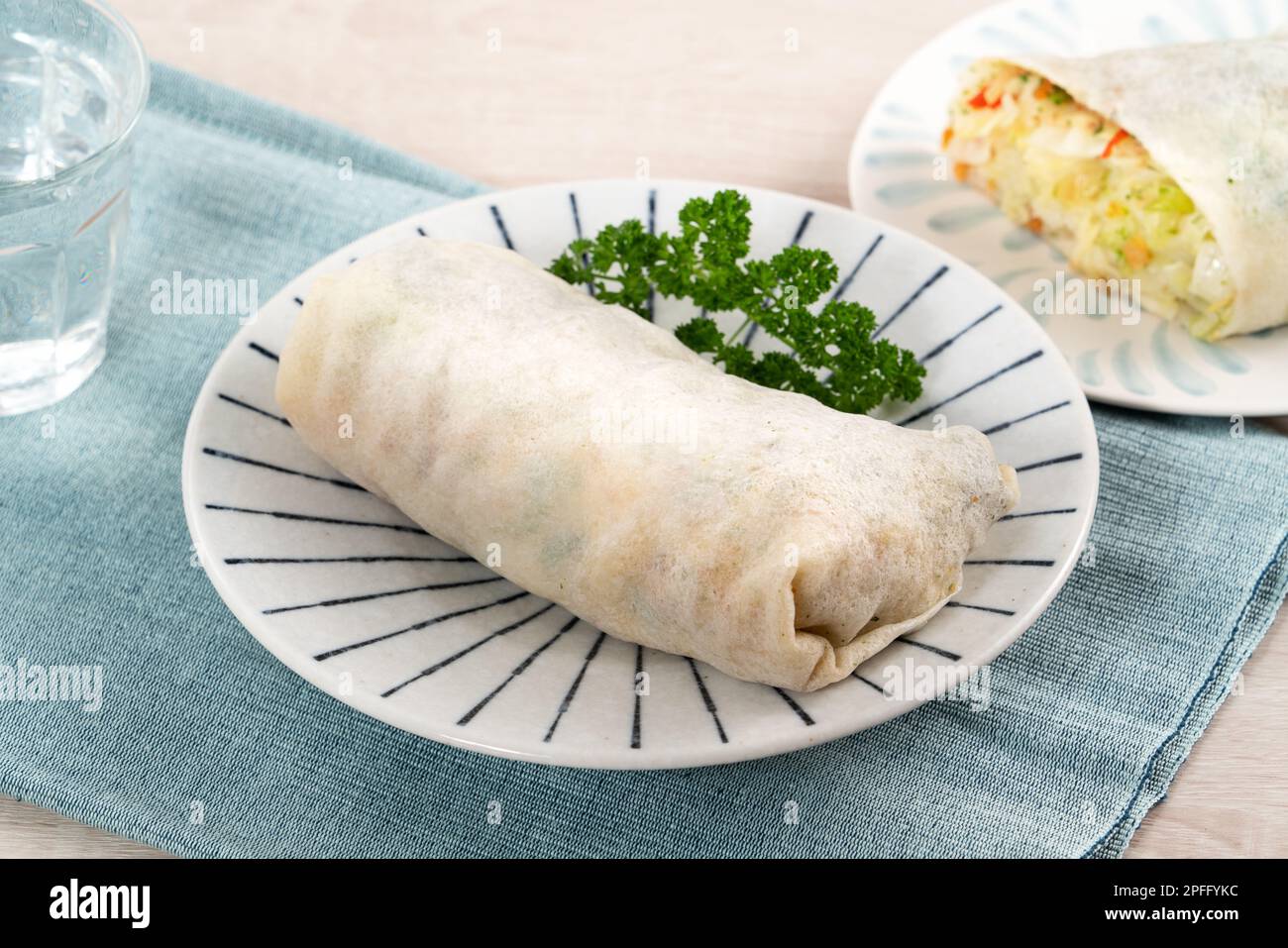Delicious popiah, lumpia, Taiwanese spring roll for traditional Tomb Sweeping Day, Qingming Festival food. Stock Photo