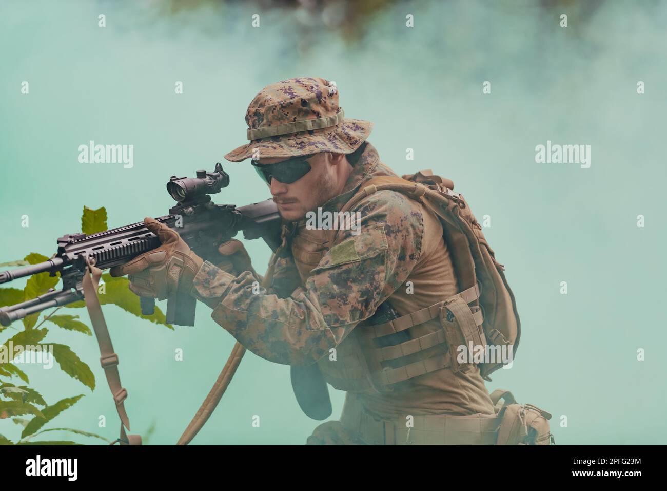 A modern warfare soldier on war duty in dense and dangerous forest ...