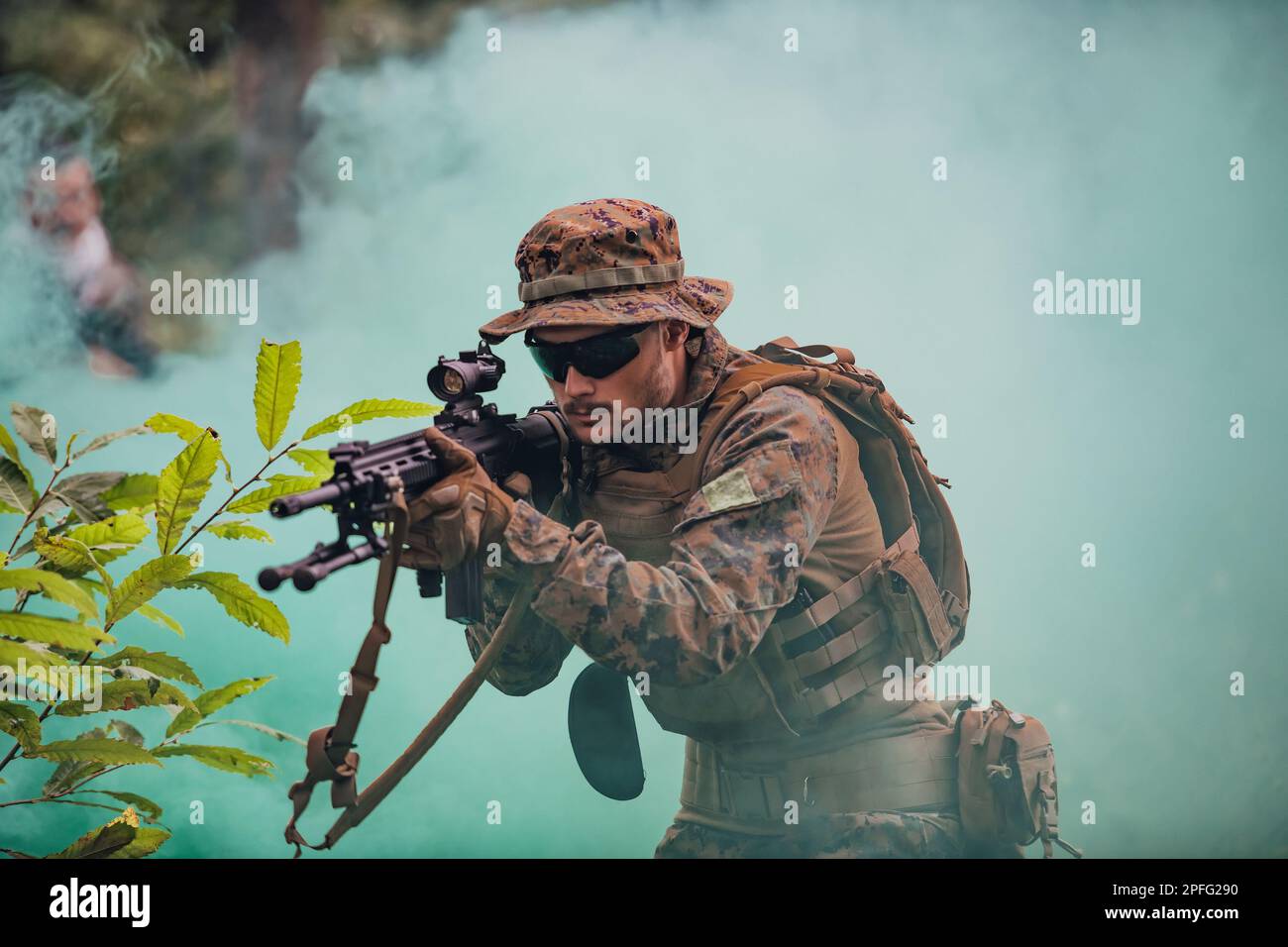 A modern warfare soldier on war duty in dense and dangerous forest ...