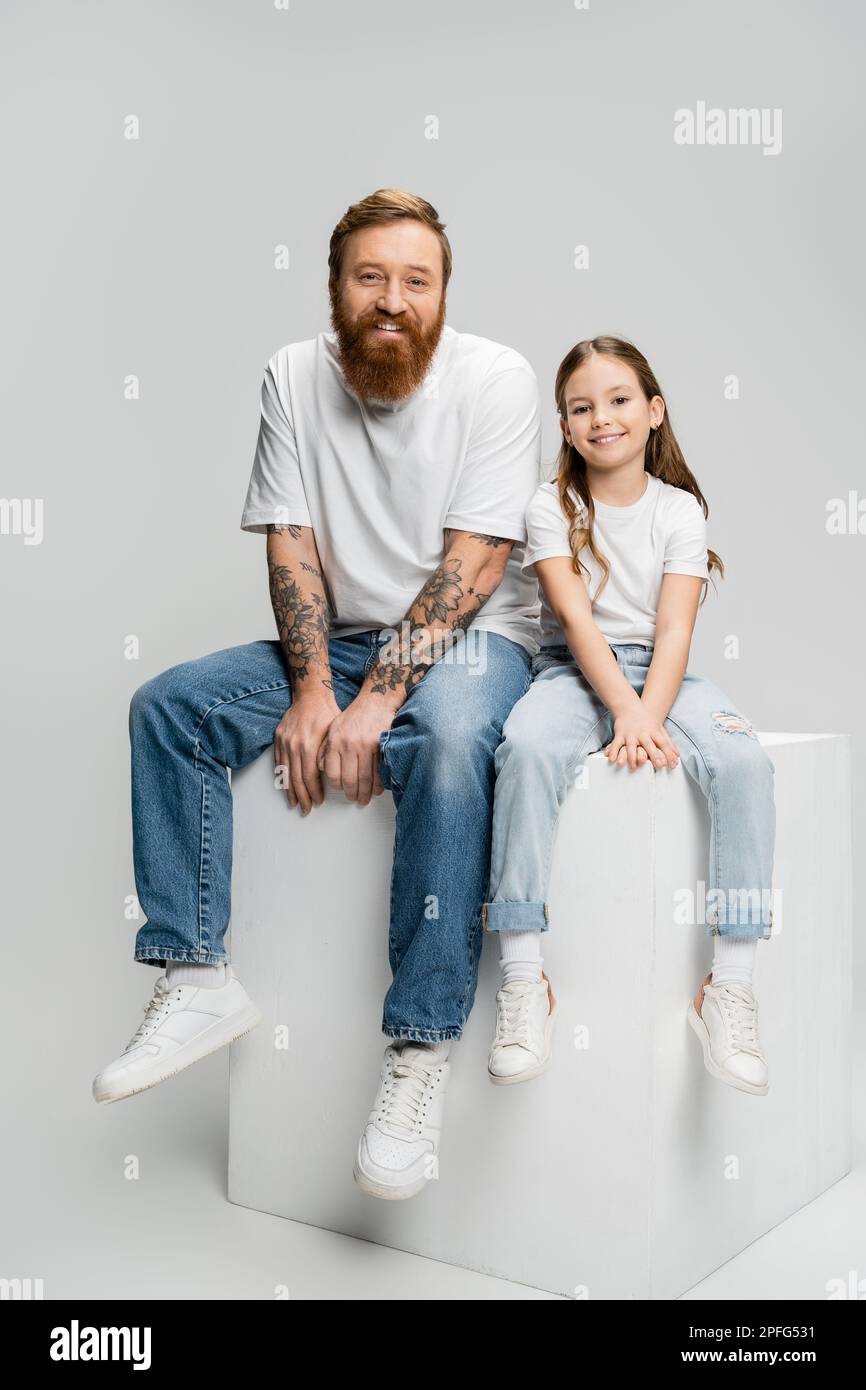Handsome girl sitting hi-res stock photography and images - Alamy