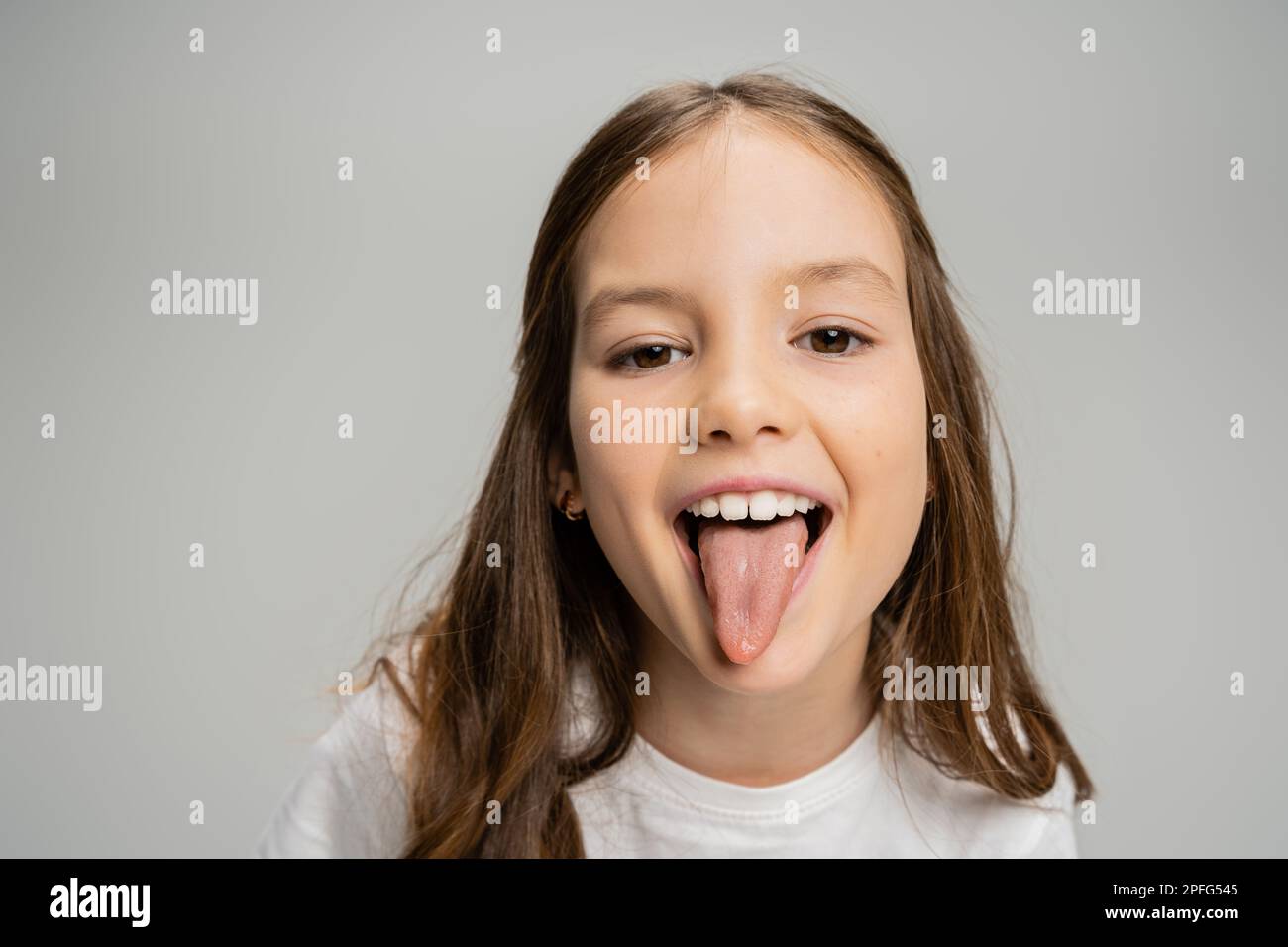 tween tongue out 