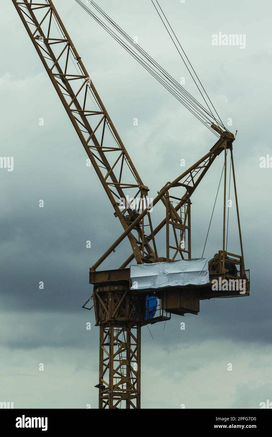 Building cranes are used in construction to lift materials to the