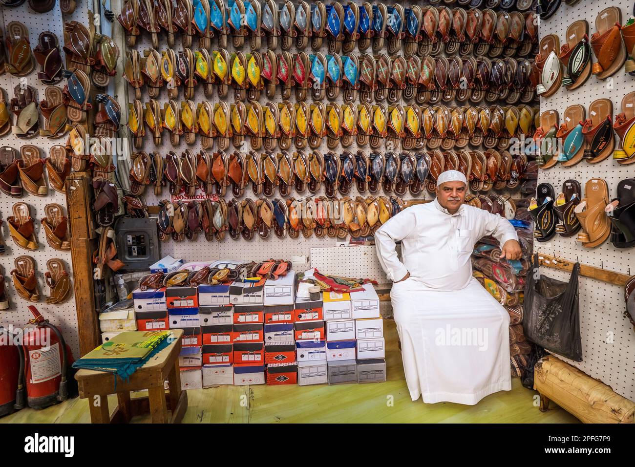 Portrait of proud shoe salesman in his shop at Souk Baab Makkah (Bab Makkah) street at the historic district Al-Balad in Jeddah, KSA, Saudi Arabia Stock Photo
