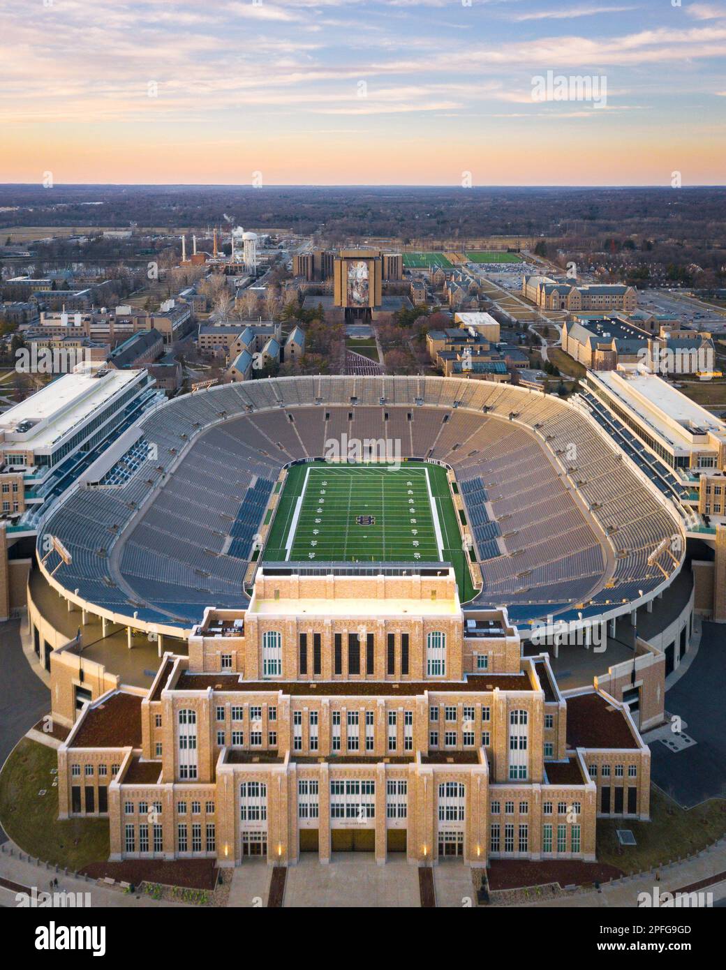 Famous Notre Dame Stadium at Sunset on Beautiful Day in South Bend, Indiana Stock Photo