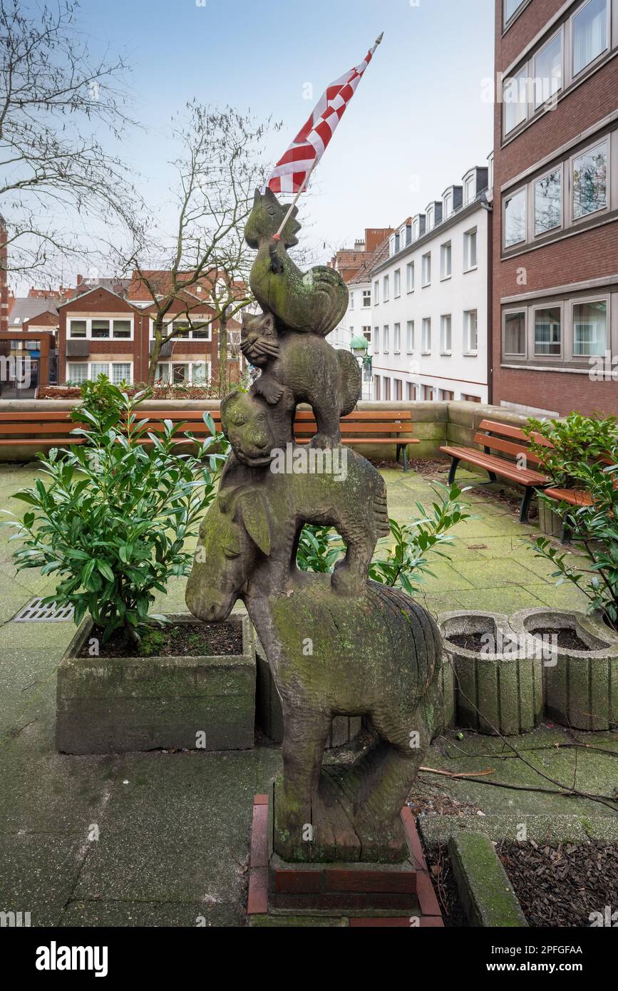 Town Musicians of Bremen Sculpture made of wood at Schnoor quarter - Bremen, Germany Stock Photo