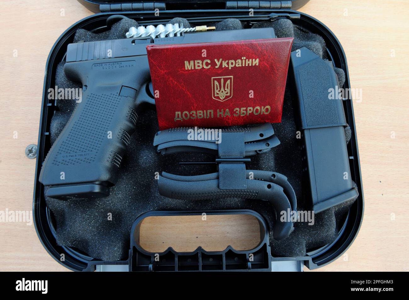 Fire-Arm Glock placed on a box. It was awarded soldiers of KORD (police special forces, Ukrainian SWAT). September 5,2018. Kiev, Ukraine Stock Photo