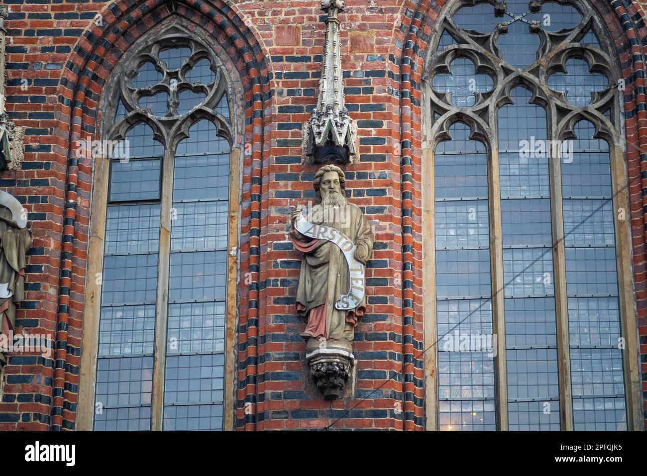 Aristotle Sculpture at Old Town Hall Facade - Bremen, Germany Stock Photo