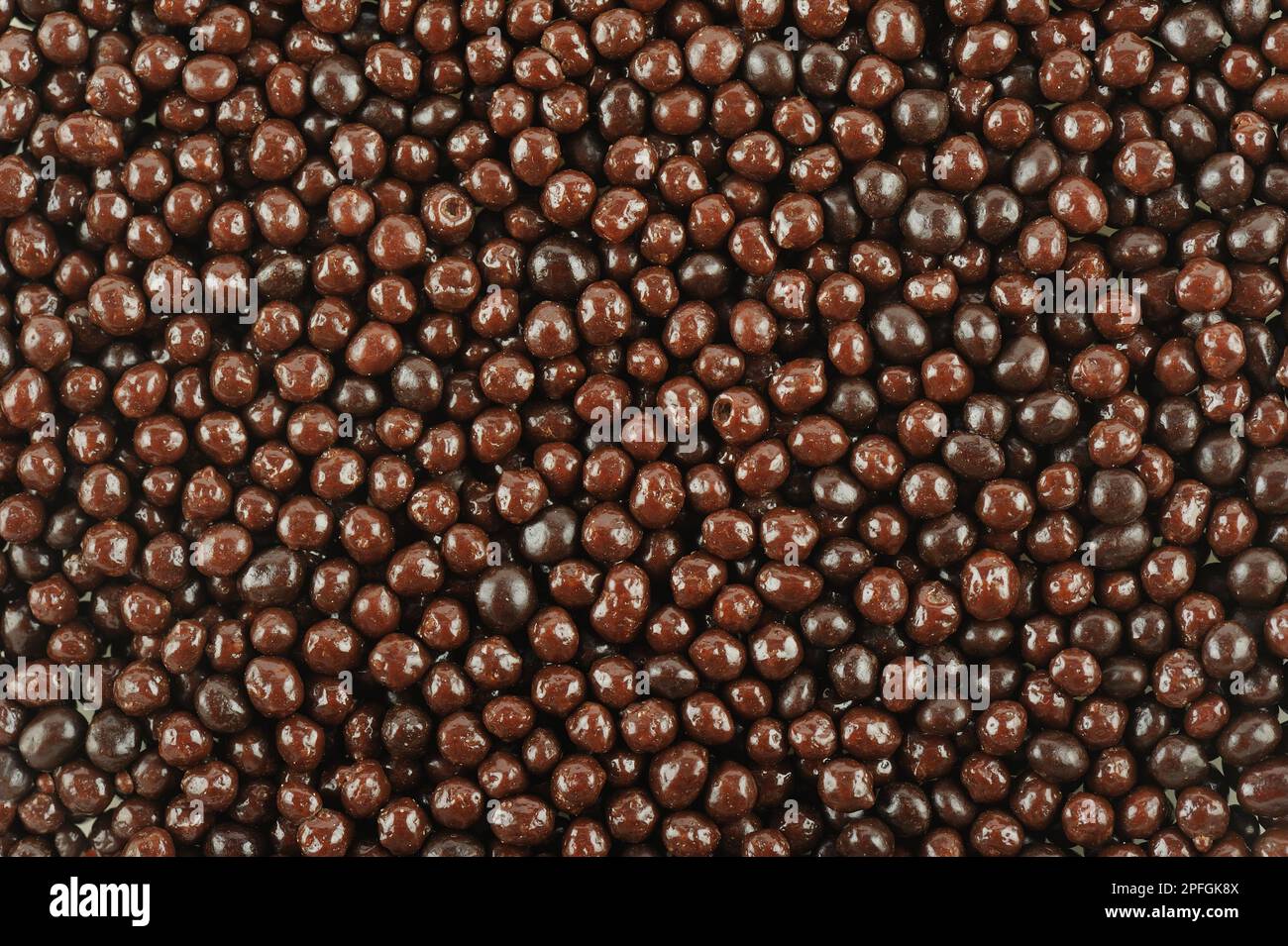 chocolate beans in the store. macro. full frame Stock Photo