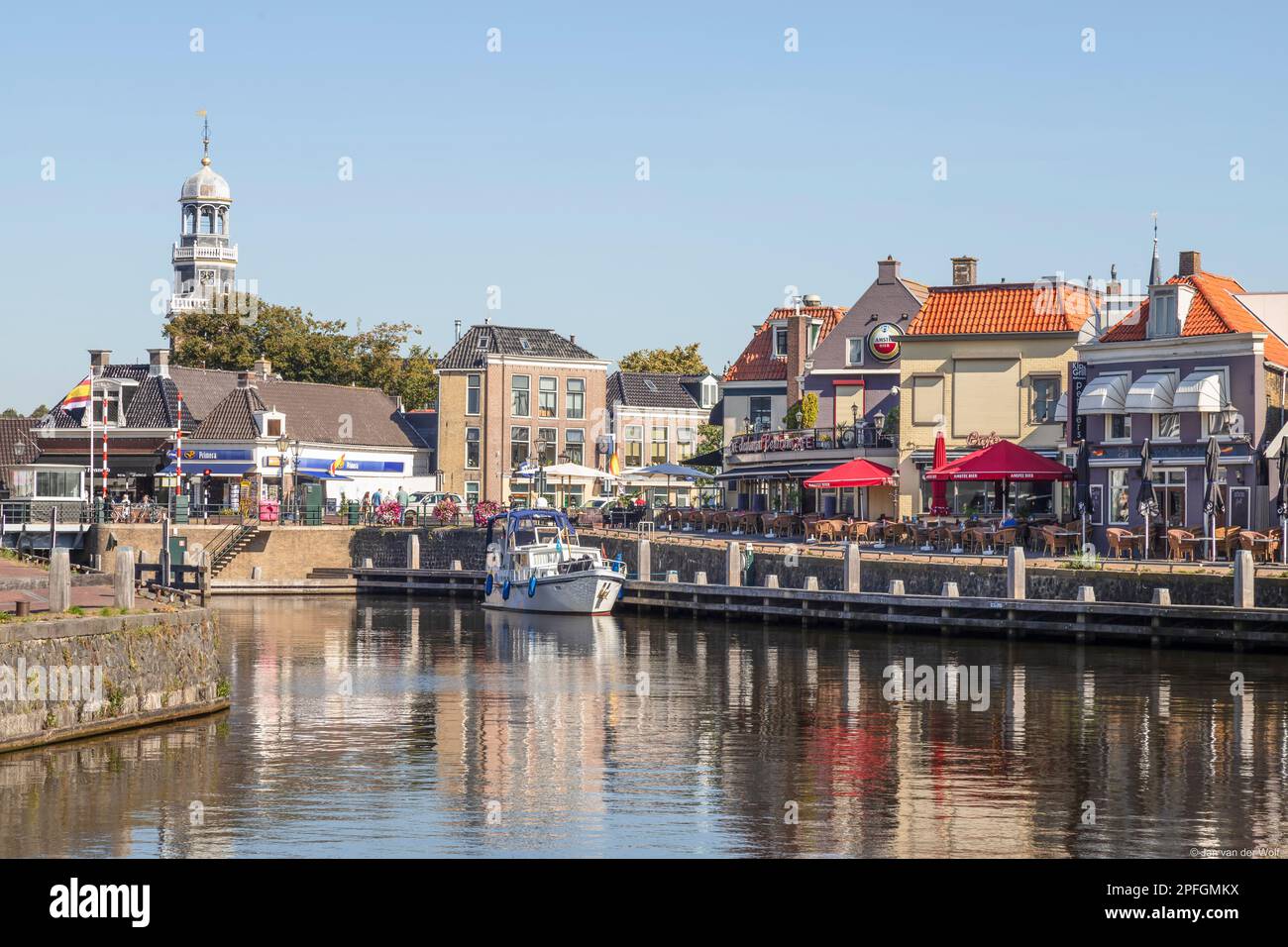 Port of the cozy picturesque Frisian fishing village of Lemmer. Stock Photo