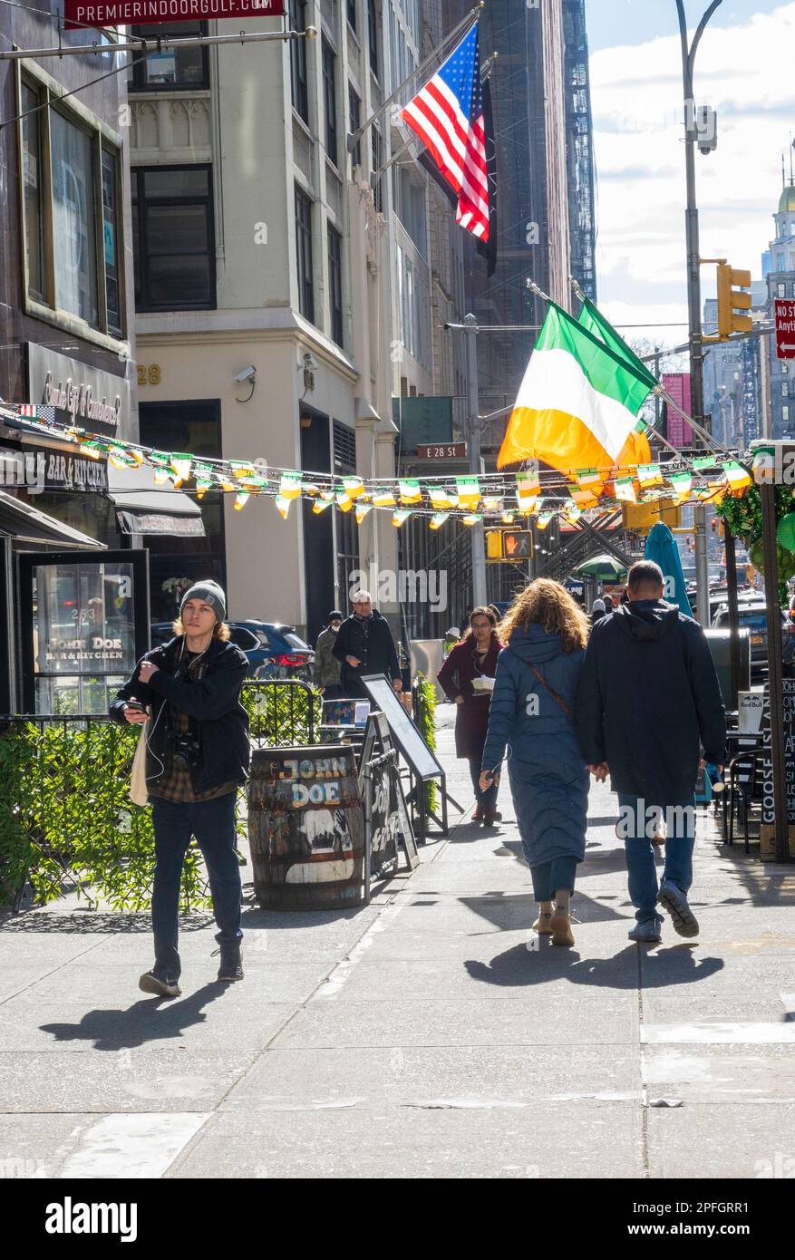The John Doe, Irish pub on fifth Avenue decorated with Irish flags for the annual St. Patrick's Day celebrations, 2023, New York City, USA Stock Photo