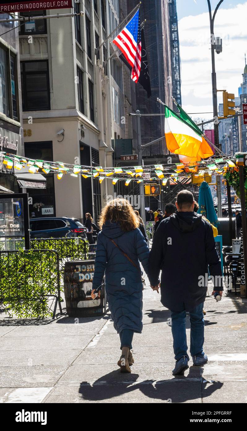 The John Doe, Irish pub on fifth Avenue decorated with Irish flags for the annual St. Patrick's Day celebrations, 2023, New York City, USA Stock Photo