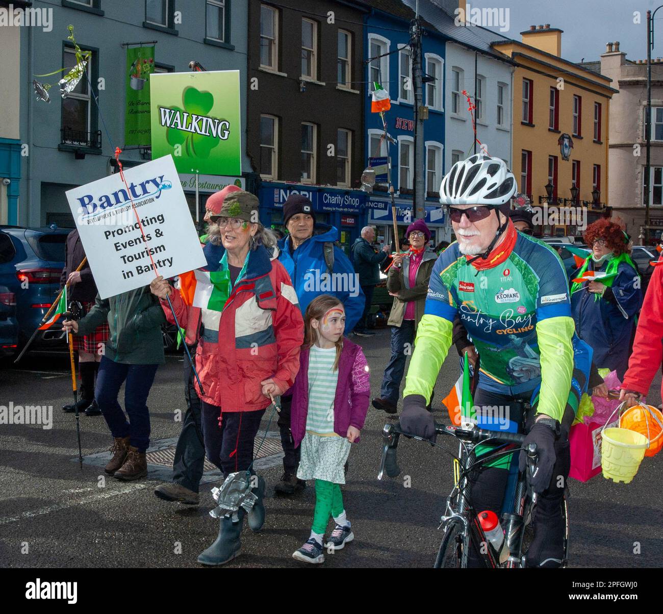 Friday 17 Mar 2023 Bantry West Cork, Ireland; Bantry held it’s St. Patrick’s Day parade today. More than 20 floats from local schools, clubs and businesses took part with Hazel Vickery as Grand Marshall and led by Ballingeary Pipe Band. This is the 2nd parade to take place since the covid 19 pandemic. More than 200 people turned out to watch the parade which was MC’d by Gearoid O’Leary. Bantry Development and Tourism Association promoting events in Bantry Credit ED/Alamy Live News. Stock Photo