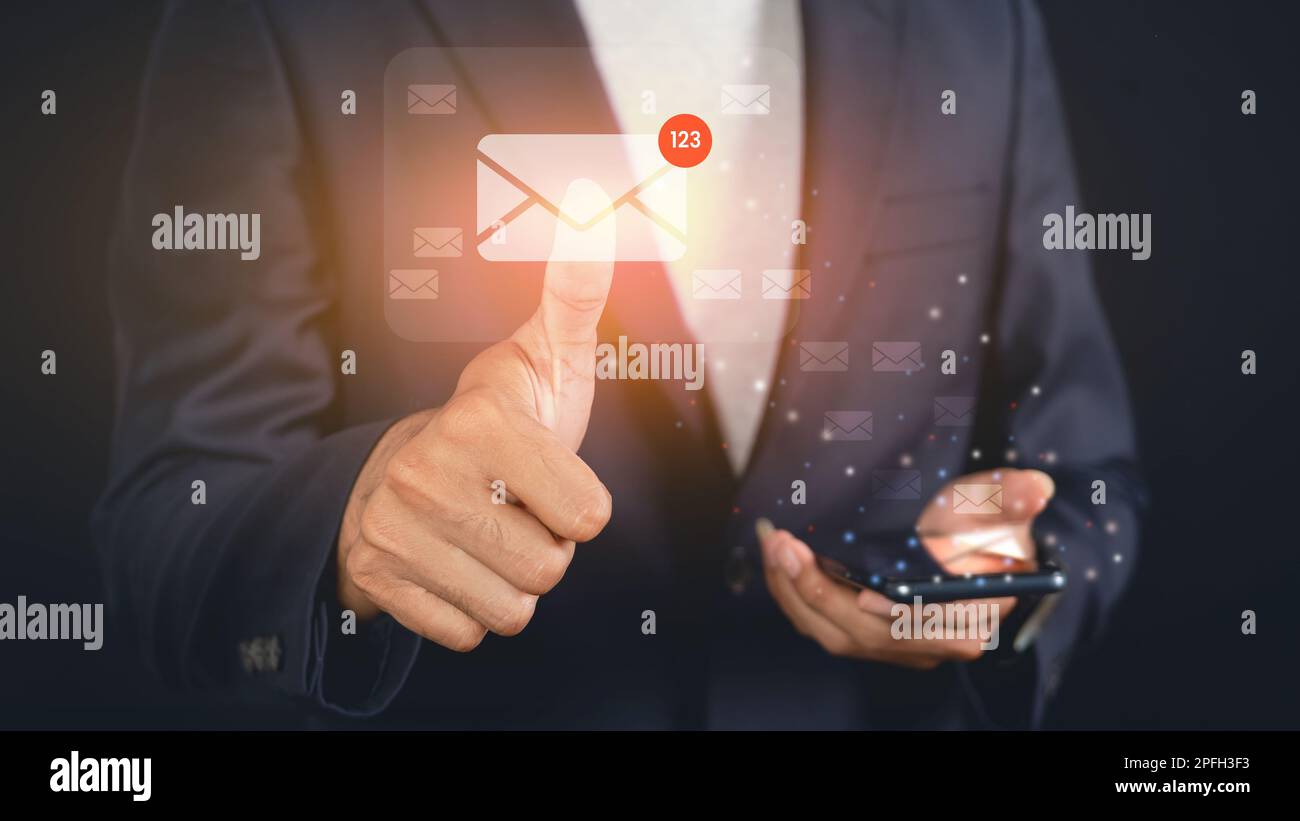 Business man touching email on virtual screen. electronic message. Email notification concept Stock Photo