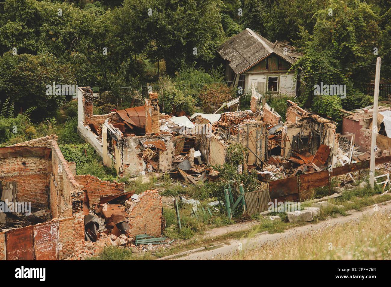 Chernihiv, Ukraine - September 9, 2022. Destroyed houses from the war. Ruins during the war of the aggressor Russia. Russia's illegal invasion of Ukra Stock Photo