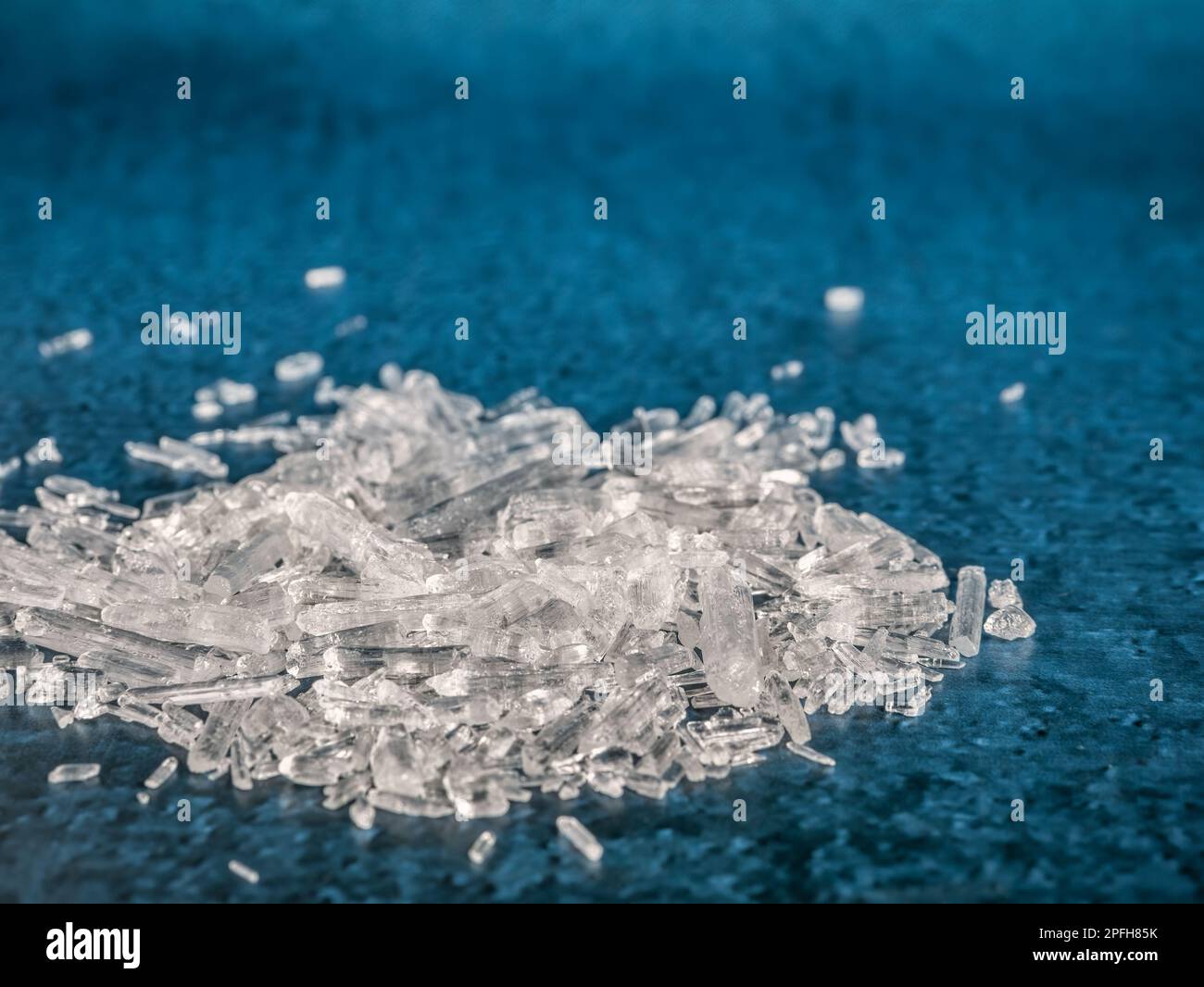 Natural menthol crystals on blue background Stock Photo Alamy