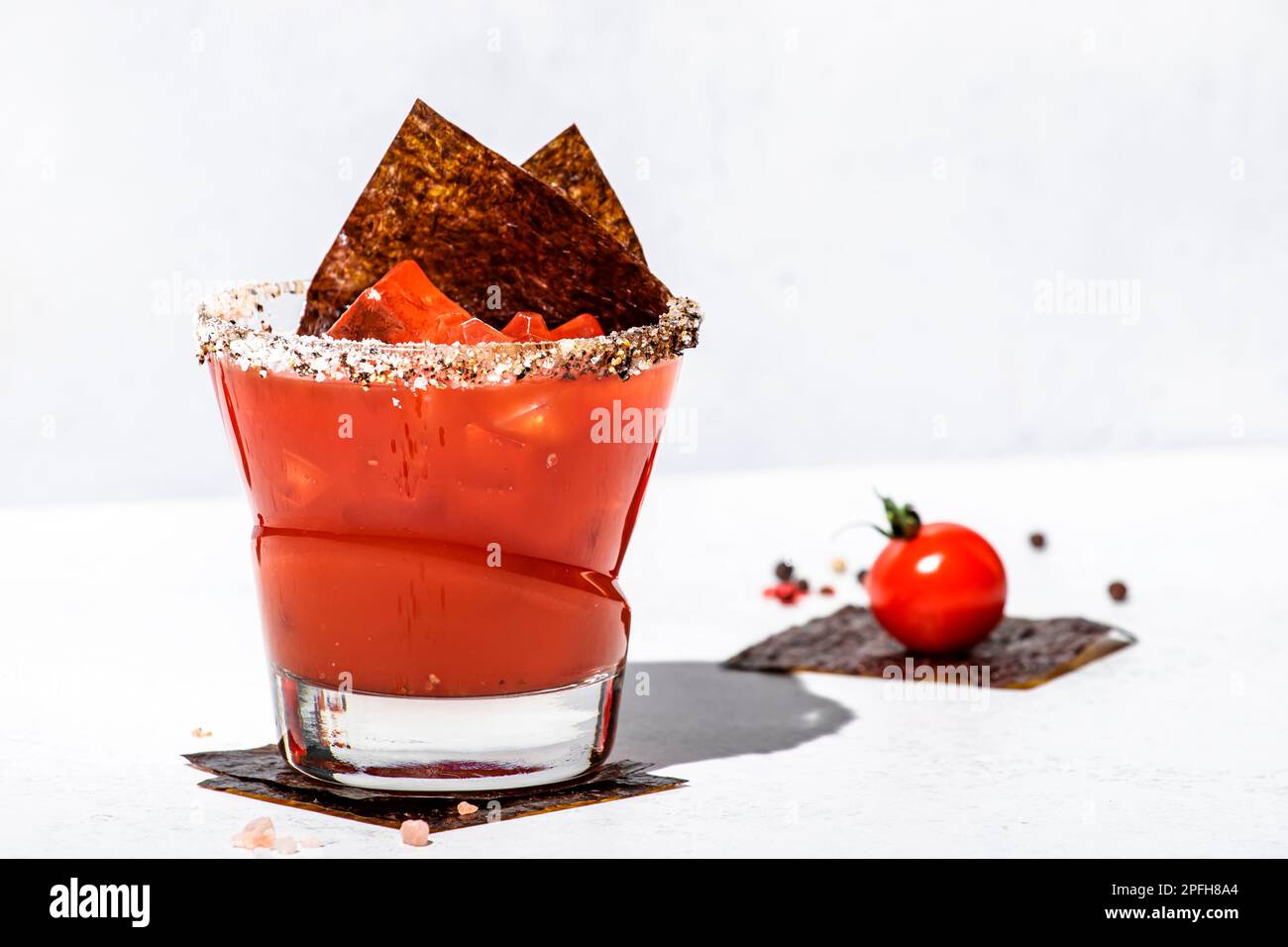 Miso mary alcoholic cocktail drink with tomato juice, spices, vodka and