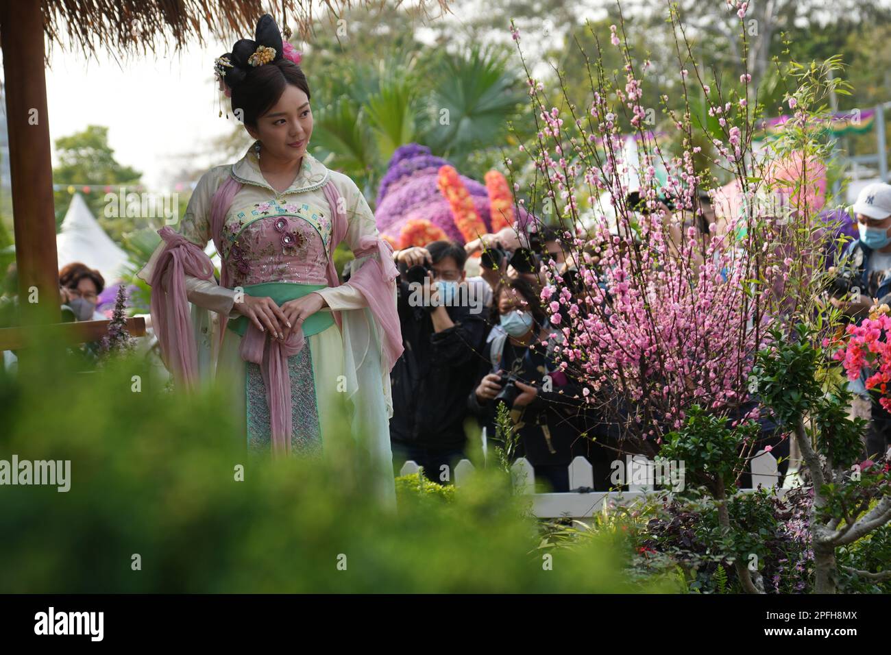 TVB actresses pose for pictures during the media preview of Hong Kong Flower Show 2023 at