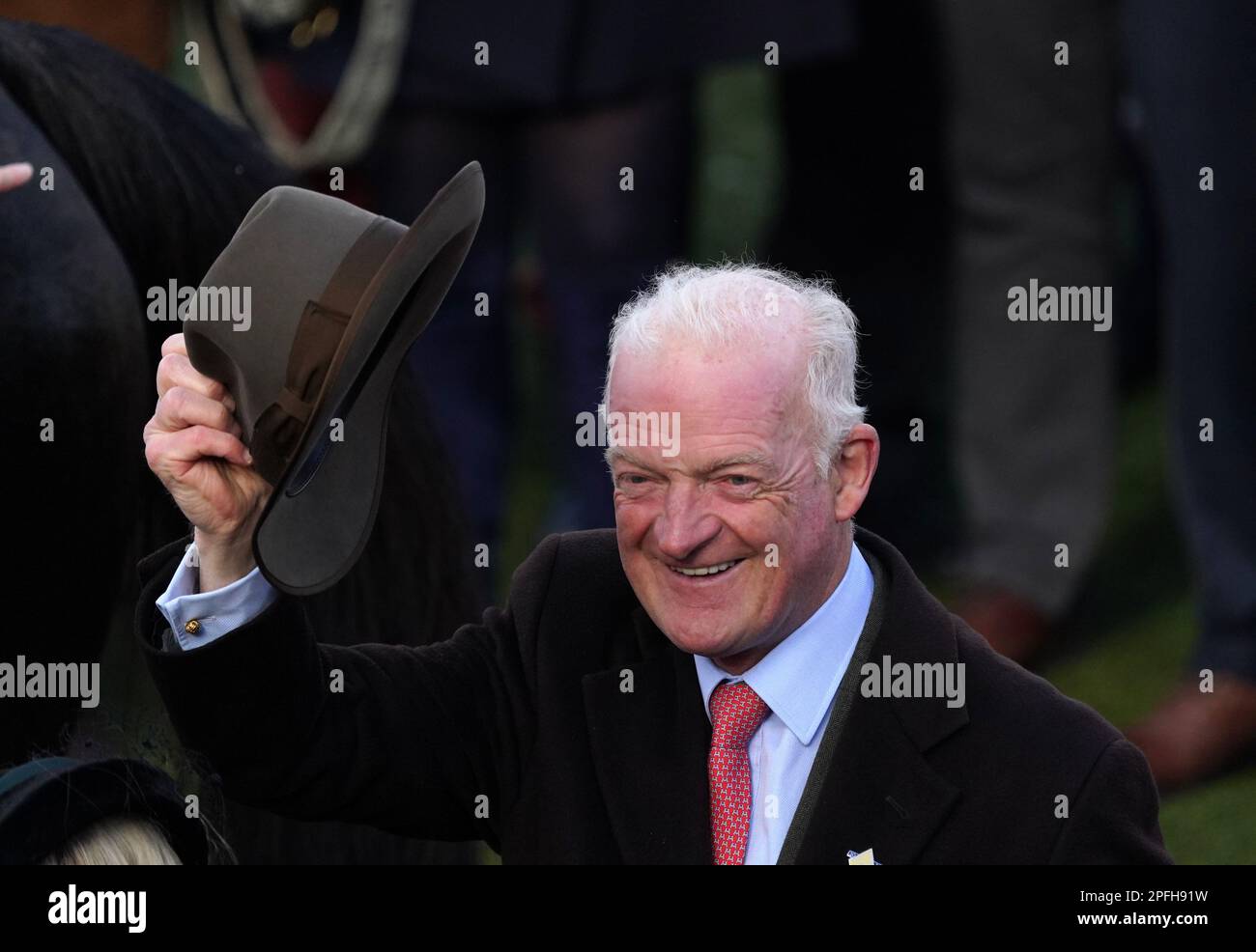 Trainer Willie Mullins celebrates after Paul Townend wins the Boodles Cheltenham Gold Cup Chase Galopin Des Champs on day four of the Cheltenham Festival at Cheltenham Racecourse. Picture date: Friday March 17, 2023. Stock Photo