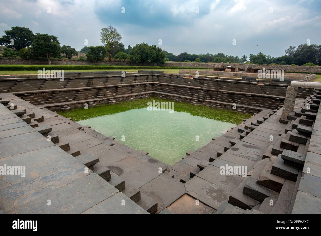 Stepped Tank or Pushkarani in the Royal enclosure area of Hampi. Hampi, the capital of the ancient Vijayanagara Empire, is a UNESCO World Heritage sit Stock Photo
