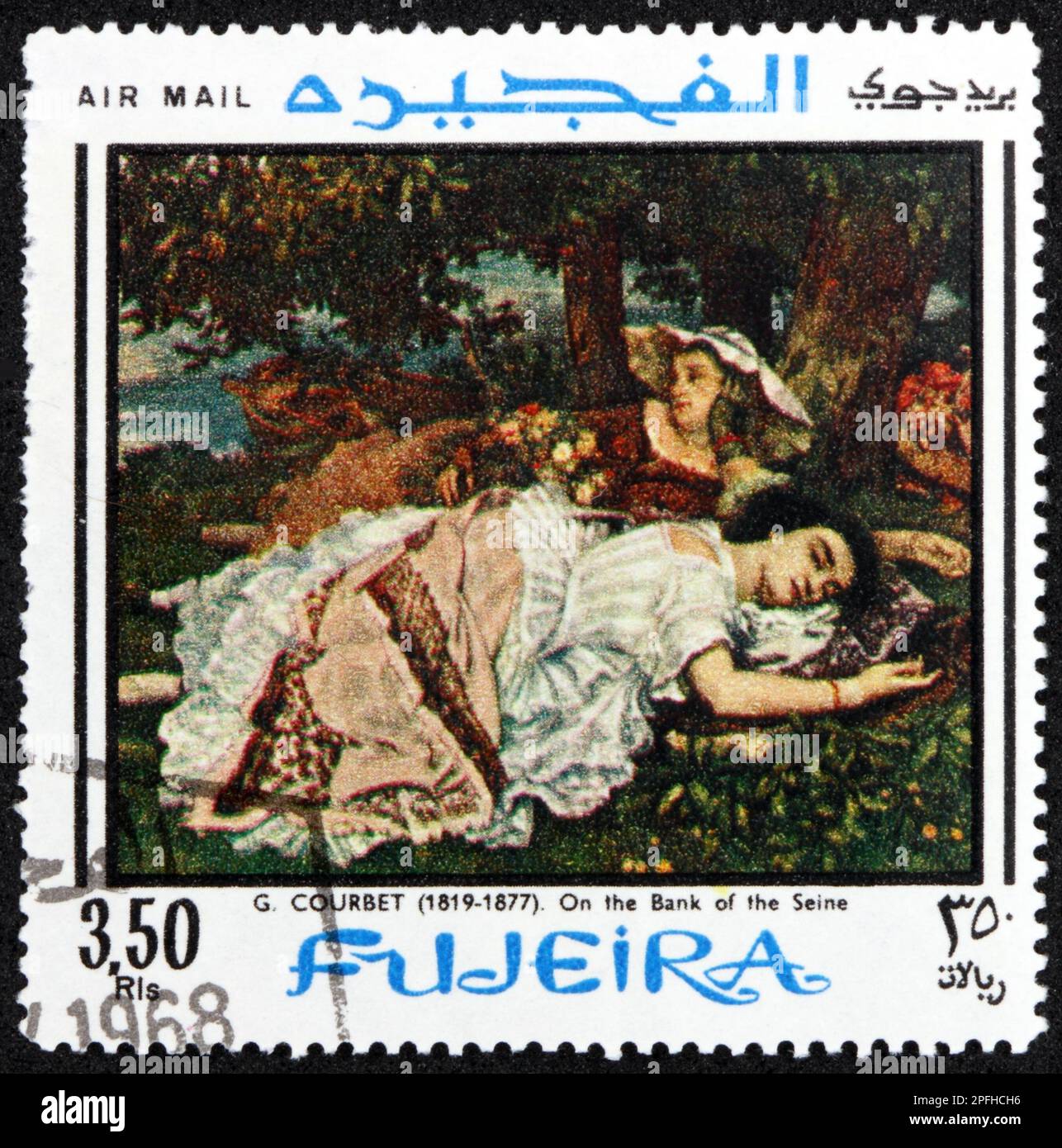 FUJEIRA - CIRCA 1968: a stamp printed in Fujeira shows On the bank of the Seine, painting by Gustave Courbet (1819-1877), French painter, circa 1968 Stock Photo