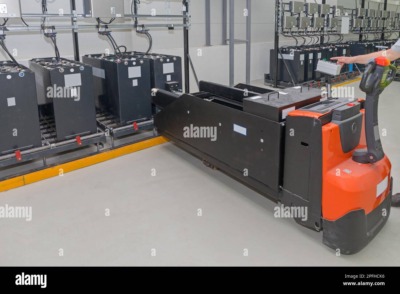 Pallet Jack Battery Cart at Industrial Charging Station Stock Photo Alamy