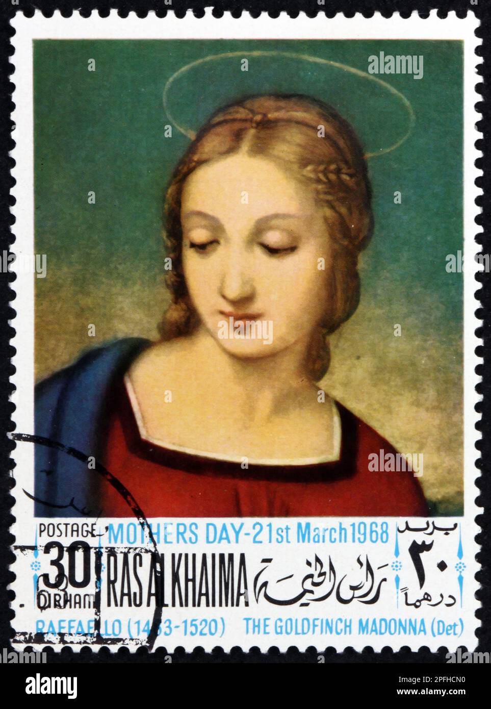 RAS AL-KHAIMAH - CIRCA 1968: a stamp printed in Ras al-Khaimah shows Madonna with the goldfinch, painting by Raphael (1483-1520) Italian painter, circ Stock Photo