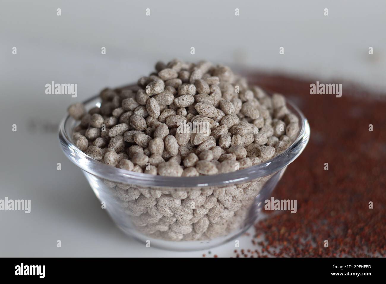 Puffed and roasted finger millet in a bowl. Finger millet is also known