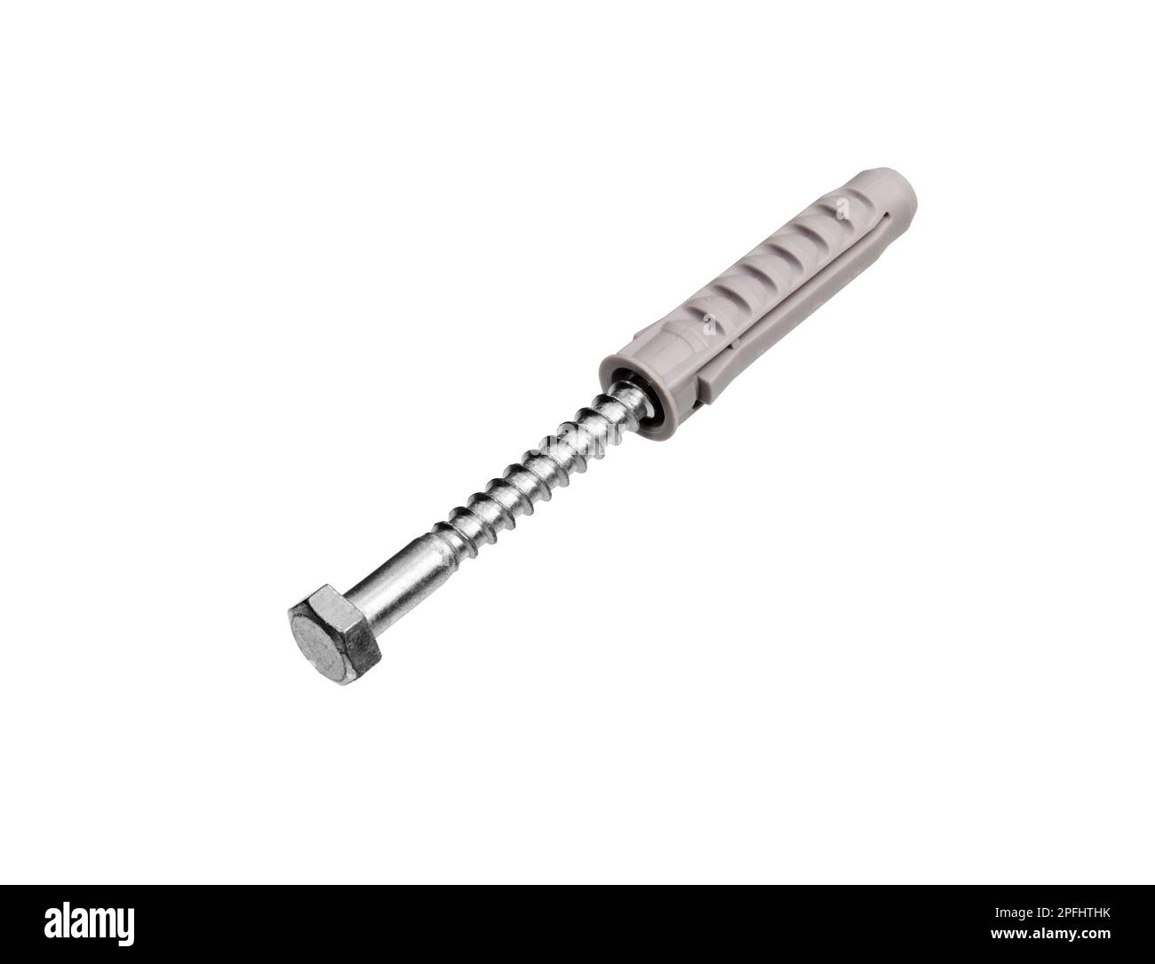 Steel screw and plastic anchor for fixture in concrete wall isolated on