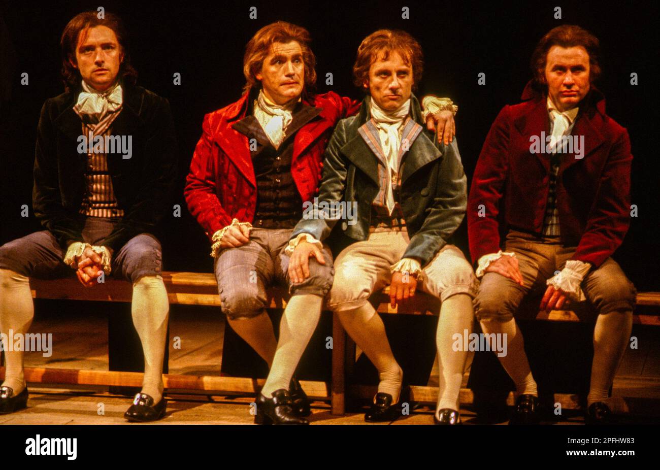 l-r: Anthony Higgins (Camille Desmoulins), Brian Cox (Danton), Tom Georgeson (Philippeau), Paul Moriarty (Lacroix) in DANTON'S DEATH by Georg Buchner at the Olivier Theatre, National Theatre (NT), London SE1  21/07/1982  in a new version by Howard Brenton  design: Alison Chitty  lighting: Stephen Wentworth  director: Peter Gill Stock Photo