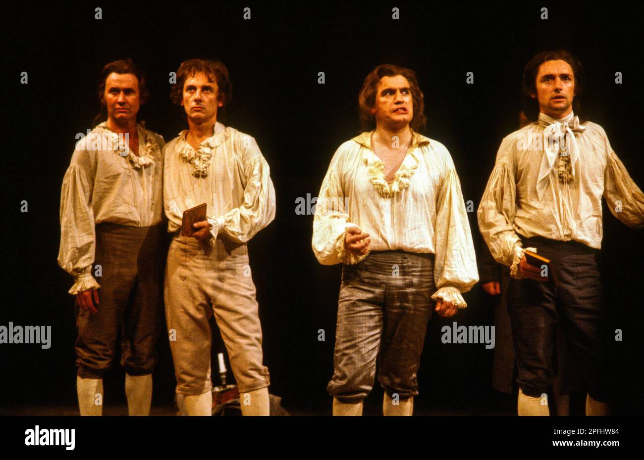 l-r: Paul Moriarty (Lacroix), Tom Georgeson (Philippeau), Brian Cox (Danton),  Anthony Higgins (Camille Desmoulins) in DANTON'S DEATH by Georg Buchner at the Olivier Theatre, National Theatre (NT), London SE1  21/07/1982  in a new version by Howard Brenton  design: Alison Chitty  lighting: Stephen Wentworth  director: Peter Gill Stock Photo