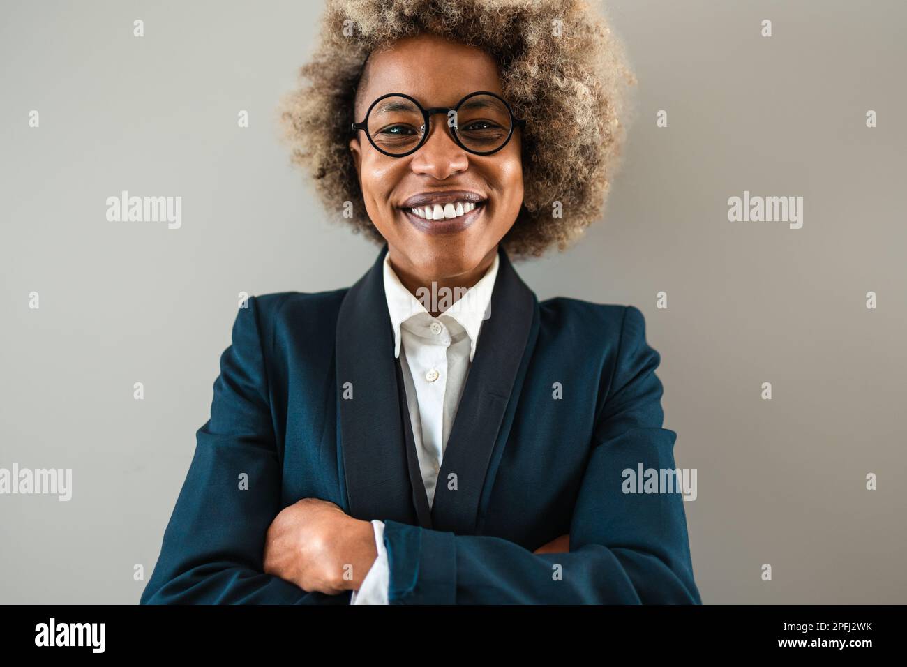 Young business woman smiling in the camera Stock Photo