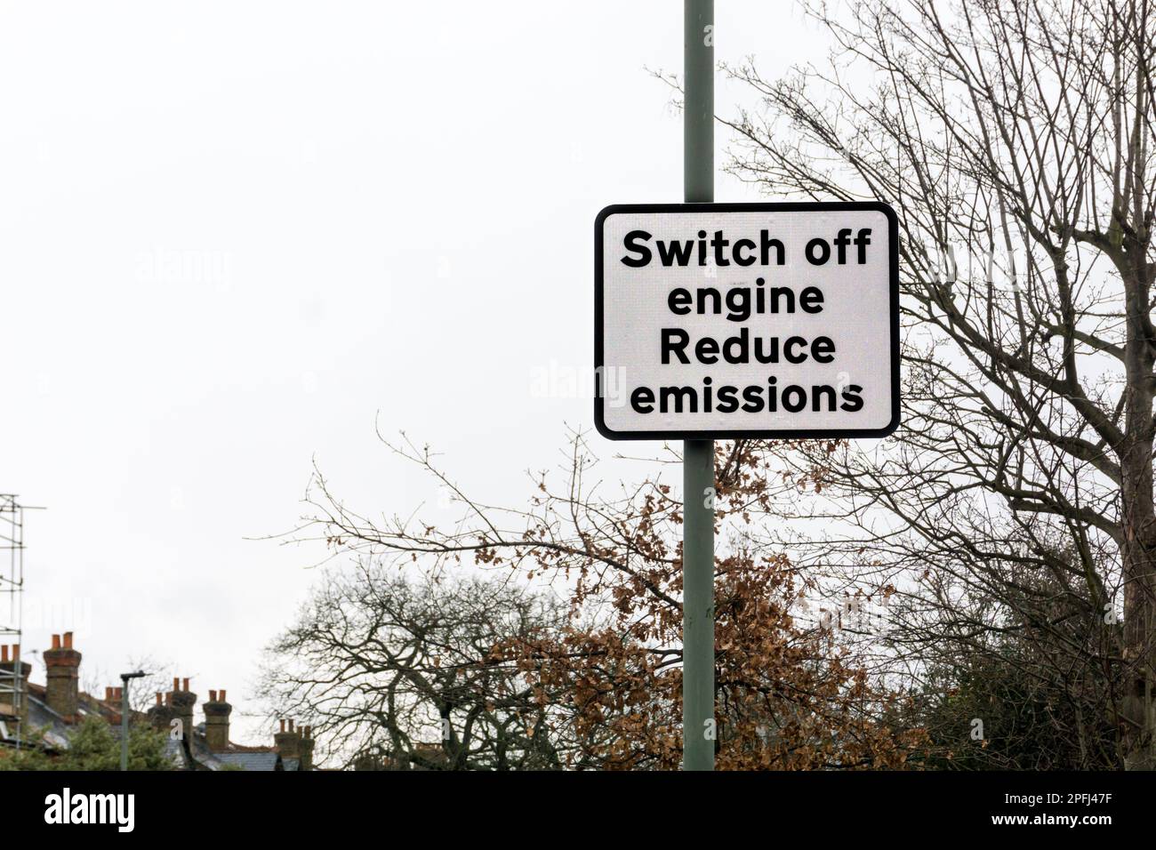 A roadsign in south London advises drivers to switch off their car engines to reduce emissions. Stock Photo