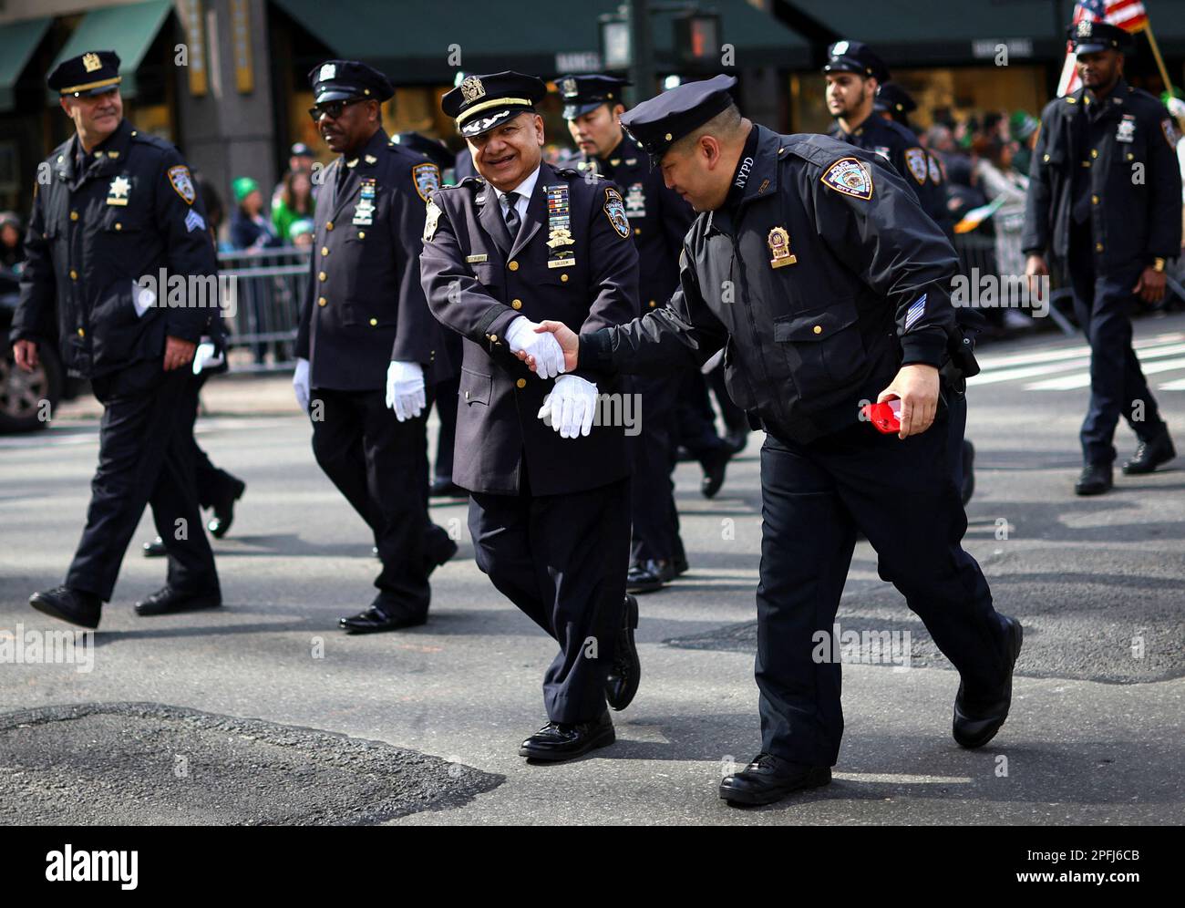 New York City Police Department (NYPD) officers greet each other as