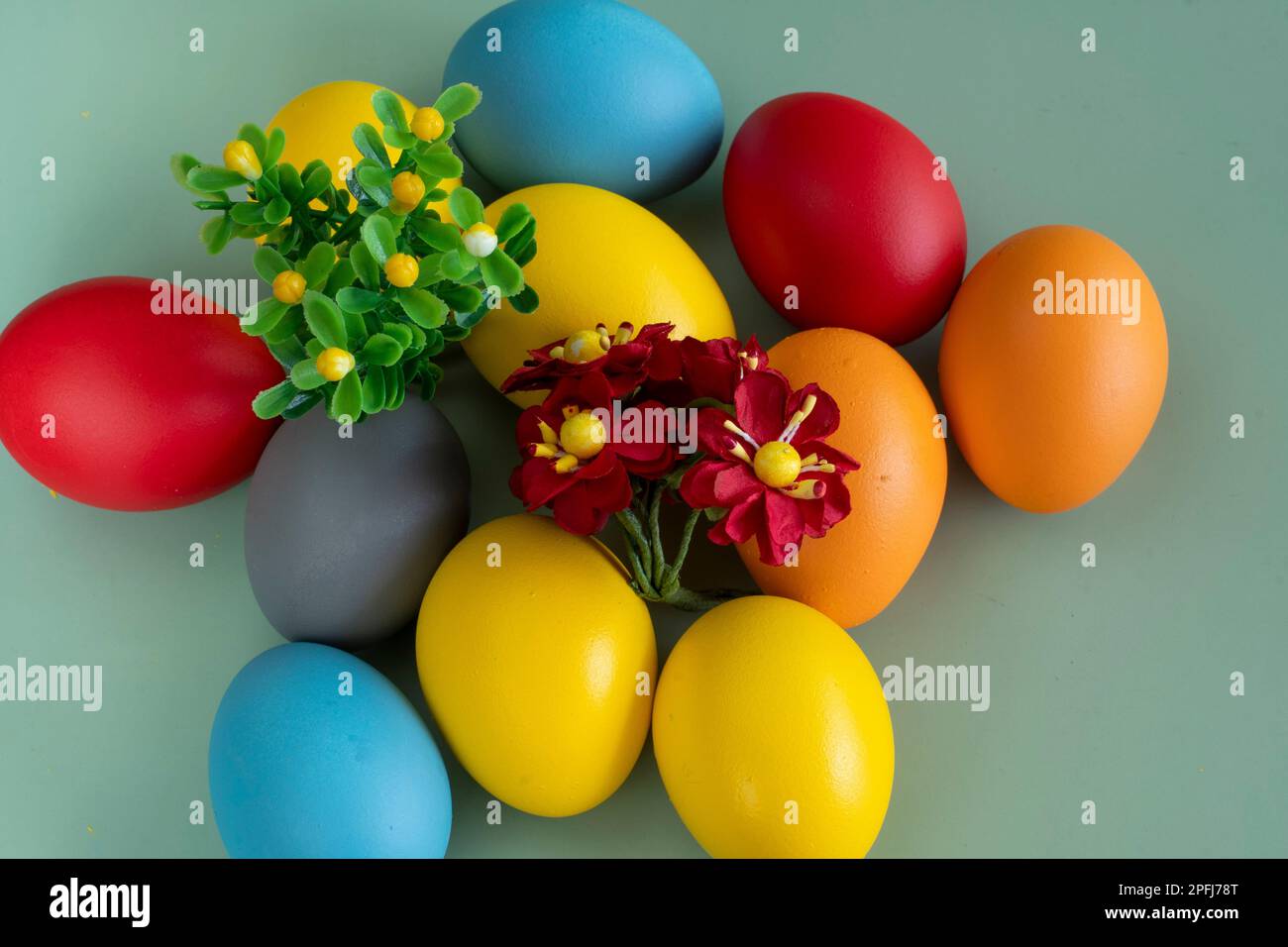 colorful eggs symbolize easter. Easter minimal concept. Creative Happy Easter, spring layout. Stock Photo