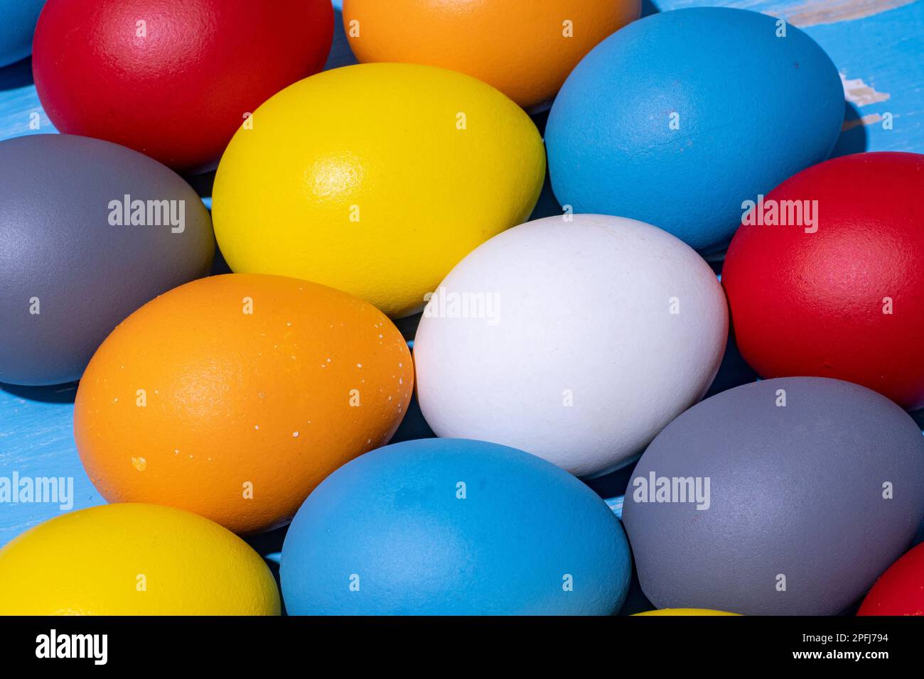 eggs painted in different colors to symbolize the passage of Christian