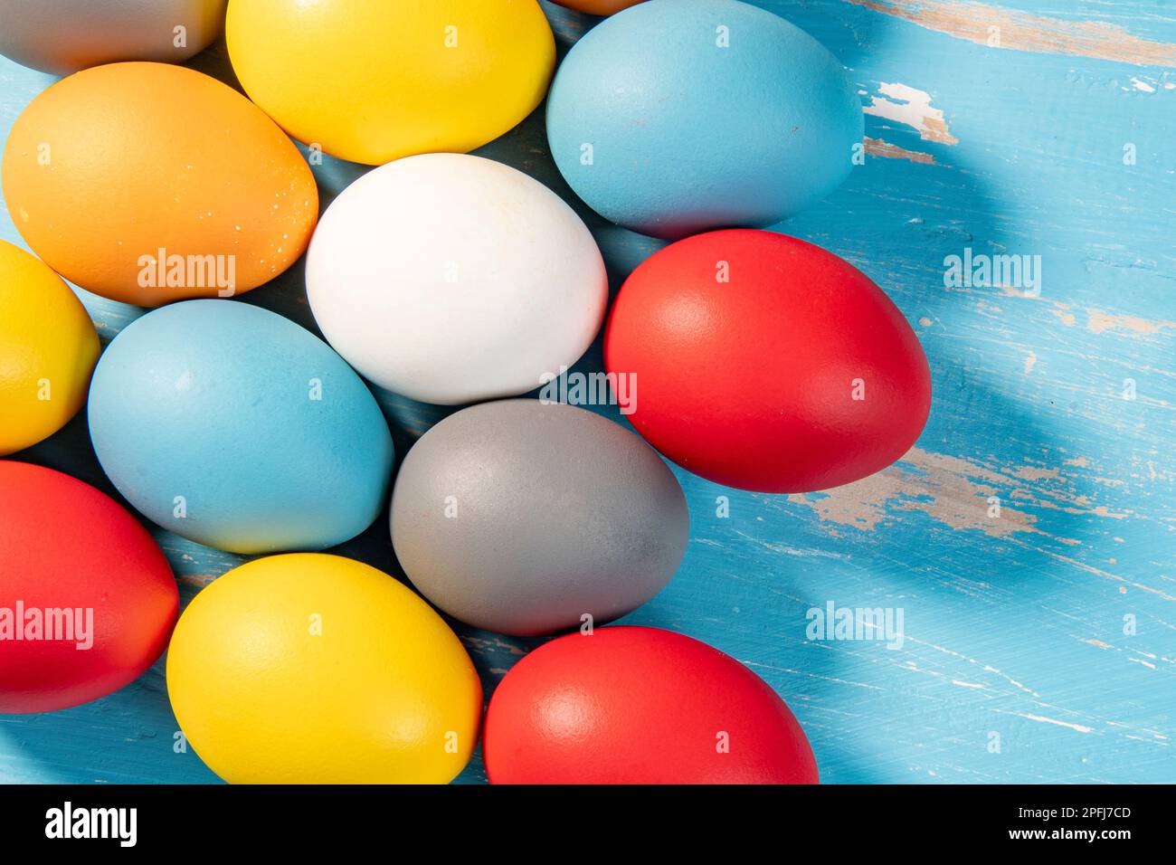 eggs painted in different colors to symbolize the passage of Christian