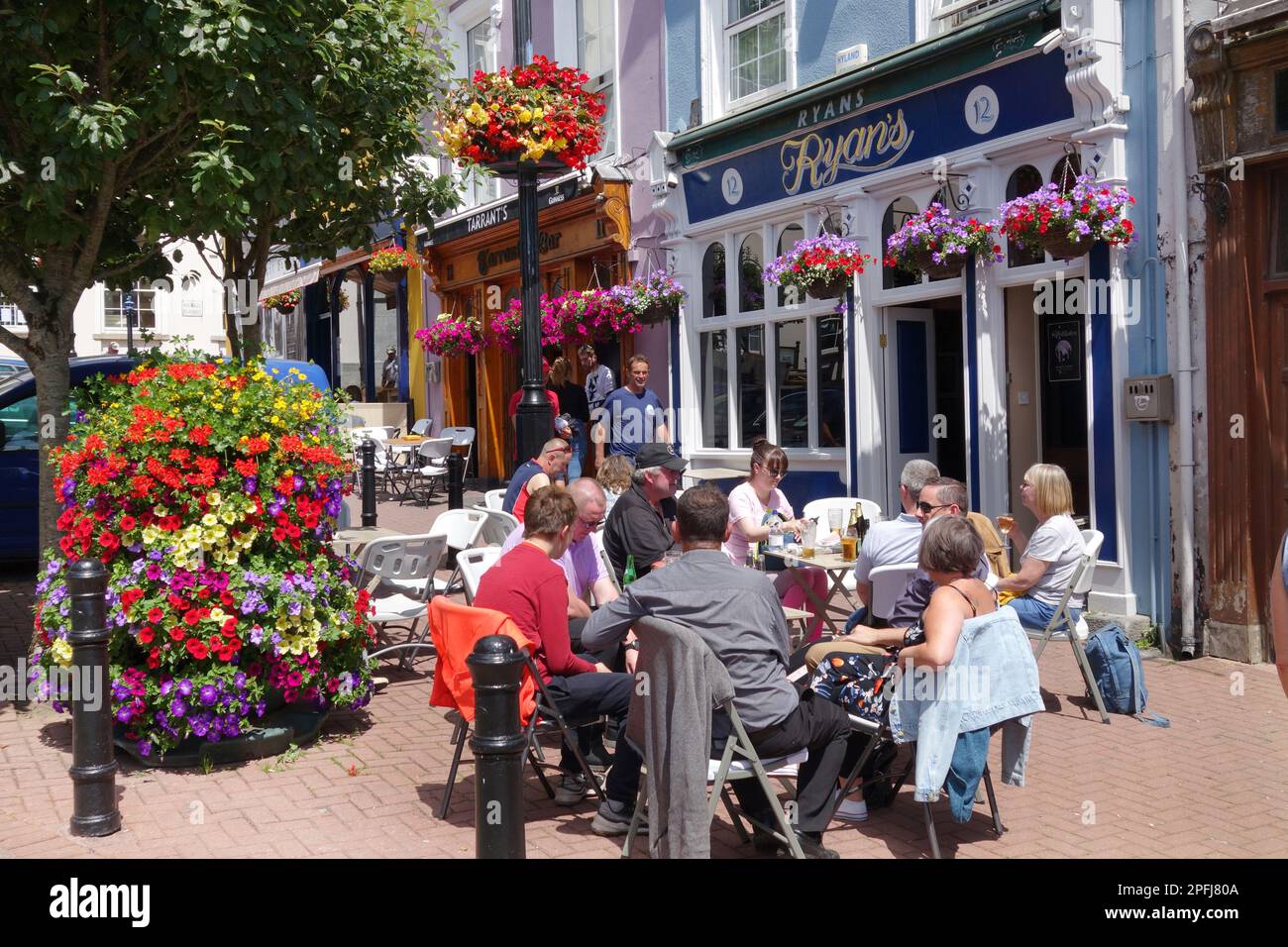 people outside Mauretania Bar, Cobh Ireland Stock Photo Alamy