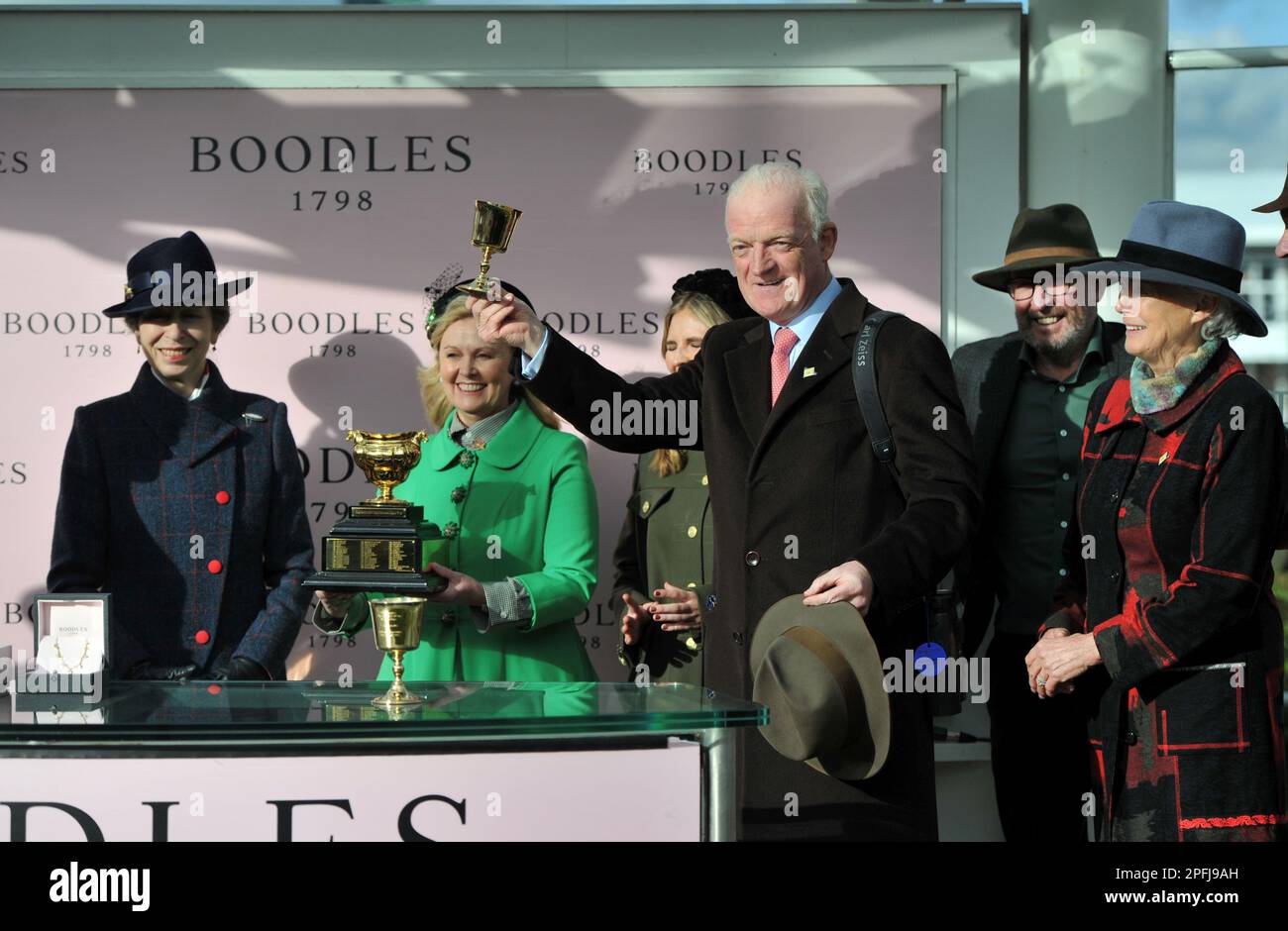Boodles Cheltenham Gold Cup Audrey Turley stands with the Gold Cup as