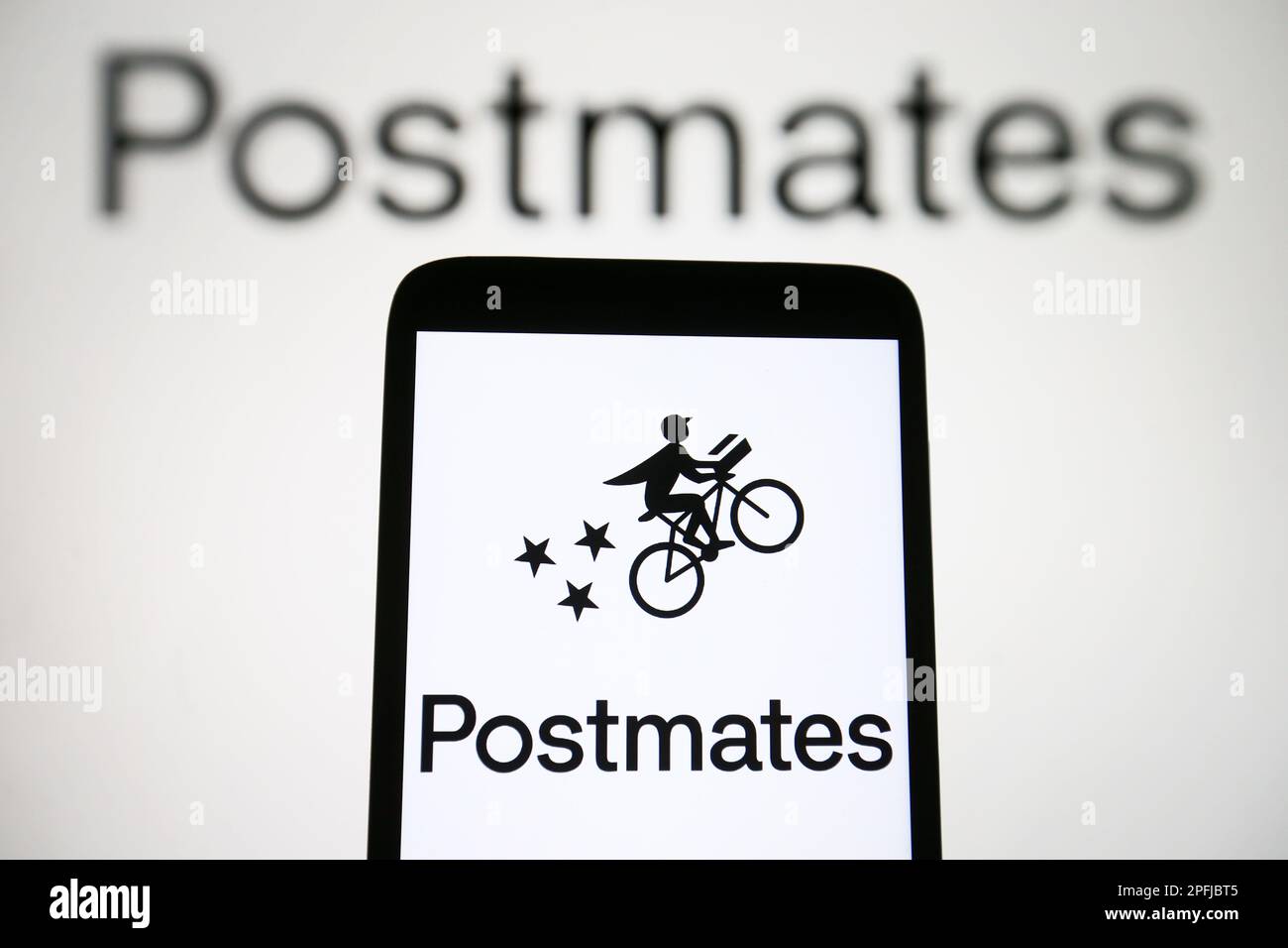 Ukraine. 17th Mar, 2023. In this photo illustration, a Postmates logo