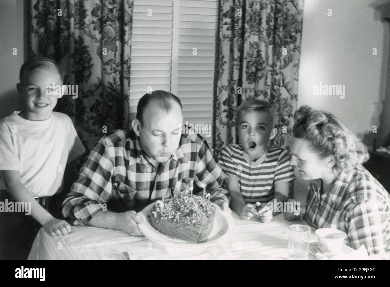 Vintage Birthday, Dad’s Birthday with Family, Dad blowing out Birthday