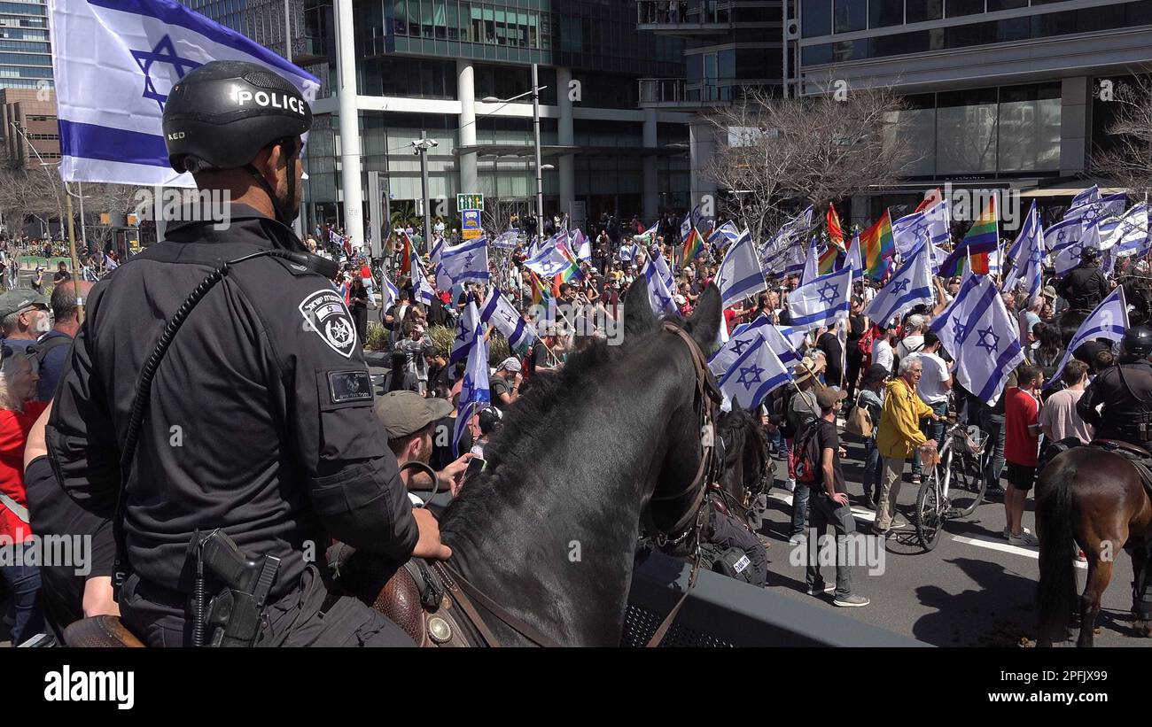 TEL AVIV, ISRAEL - MARCH 16: Israeli mounted police waits to disperse anti-government protesters blocking a motorway during a demonstration against Israel's Prime Minister Benjamin Netanyahu's new right-wing coalition and its proposed judicial changes on March 16, 2023 in Tel Aviv, Israel. Credit: Eddie Gerald/Alamy Live News Stock Photo