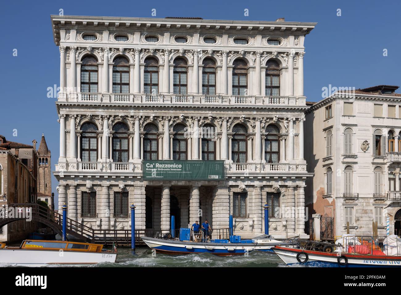 Venice, Italy - September 6, 2022: The white marble facade of Ca' Rezzonico on the Grand Canal in Venice. Italy Stock Photo