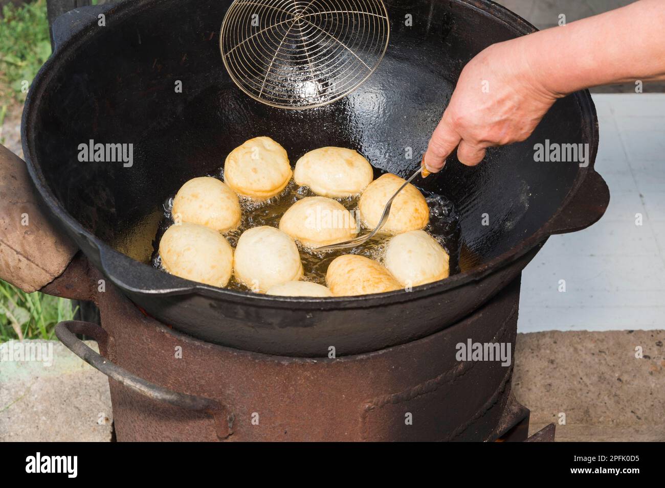 Preparation of local tandyr bread, Kazakh ethnographic village of Aul Gunny, Talgar city, Almaty, Kazakhstan, Central Asia Stock Photo